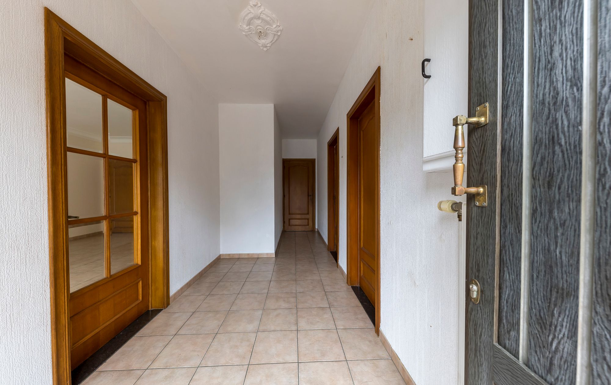 TE KOOP: Te renoveren gezinswoning met ruime tuin in Opglabbeek (Oudsbergen) foto 4