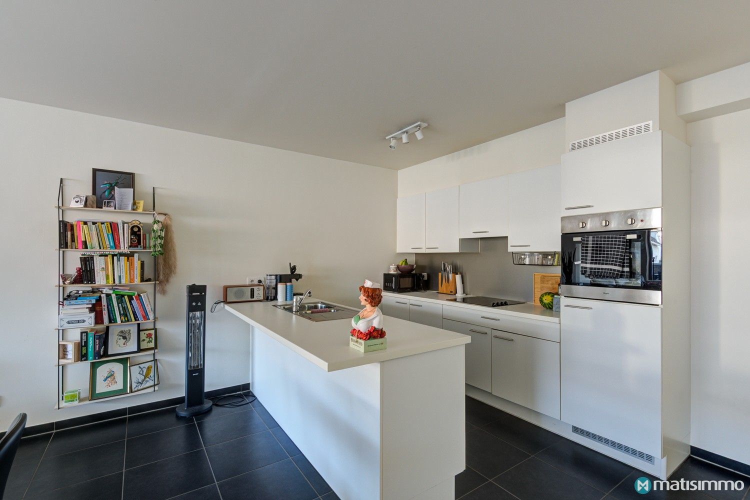 INSTAPKLAAR APPARTEMENT MET 2 SLAAPKAMERS EN AUTOSTAANPLAATS IN HET CENTRUM VAN BILZEN foto 7