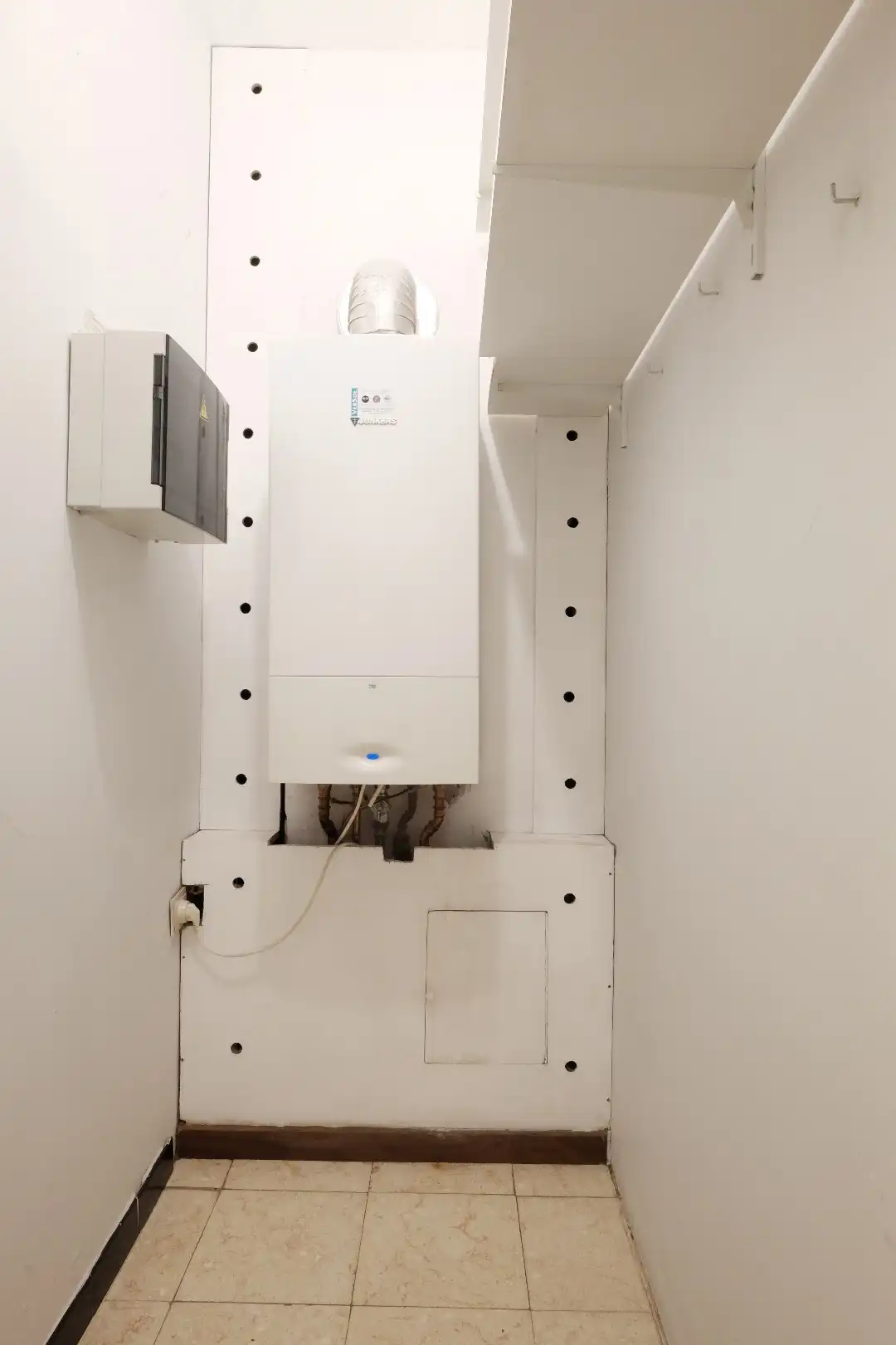Centraal gelegen gelijkvloers 2-slaapkamerappartement — ideaal als starter of opbrengsteigendom foto 16