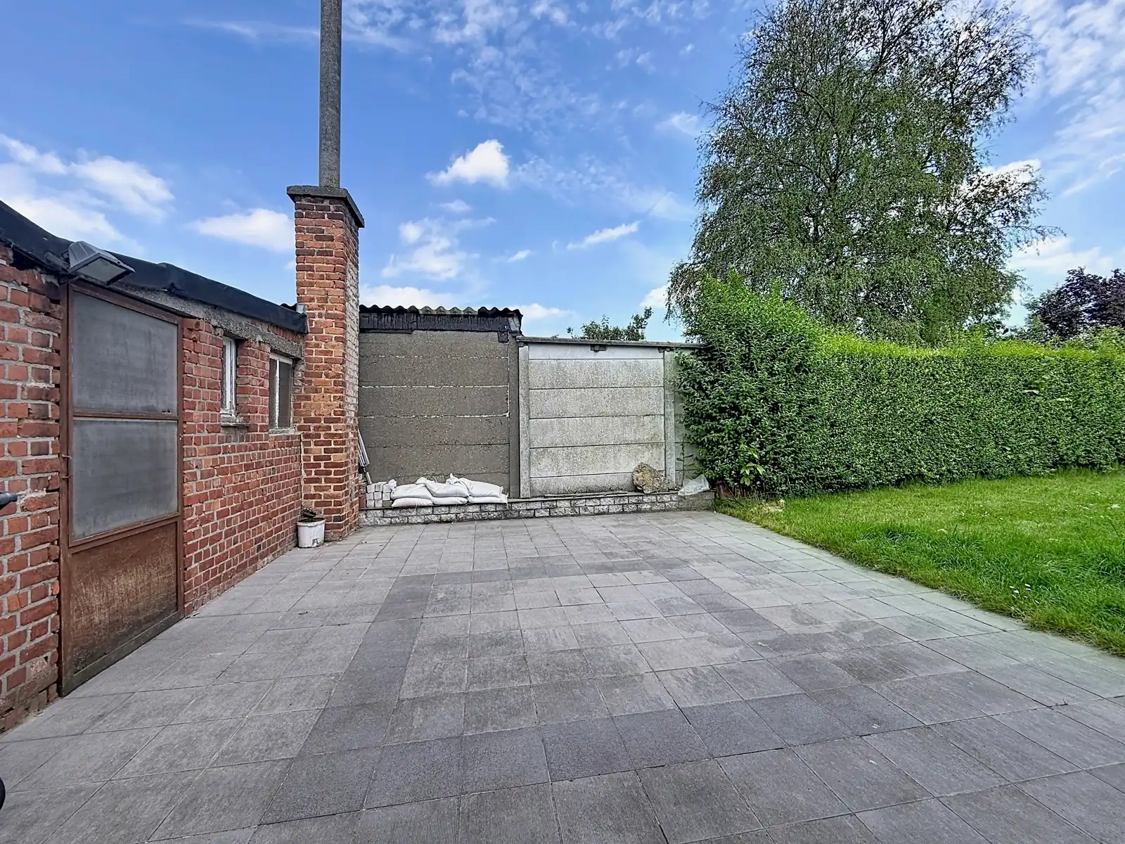 Halfopen bebouwing met 3 SLPK, diepe tuin én garage! foto 19