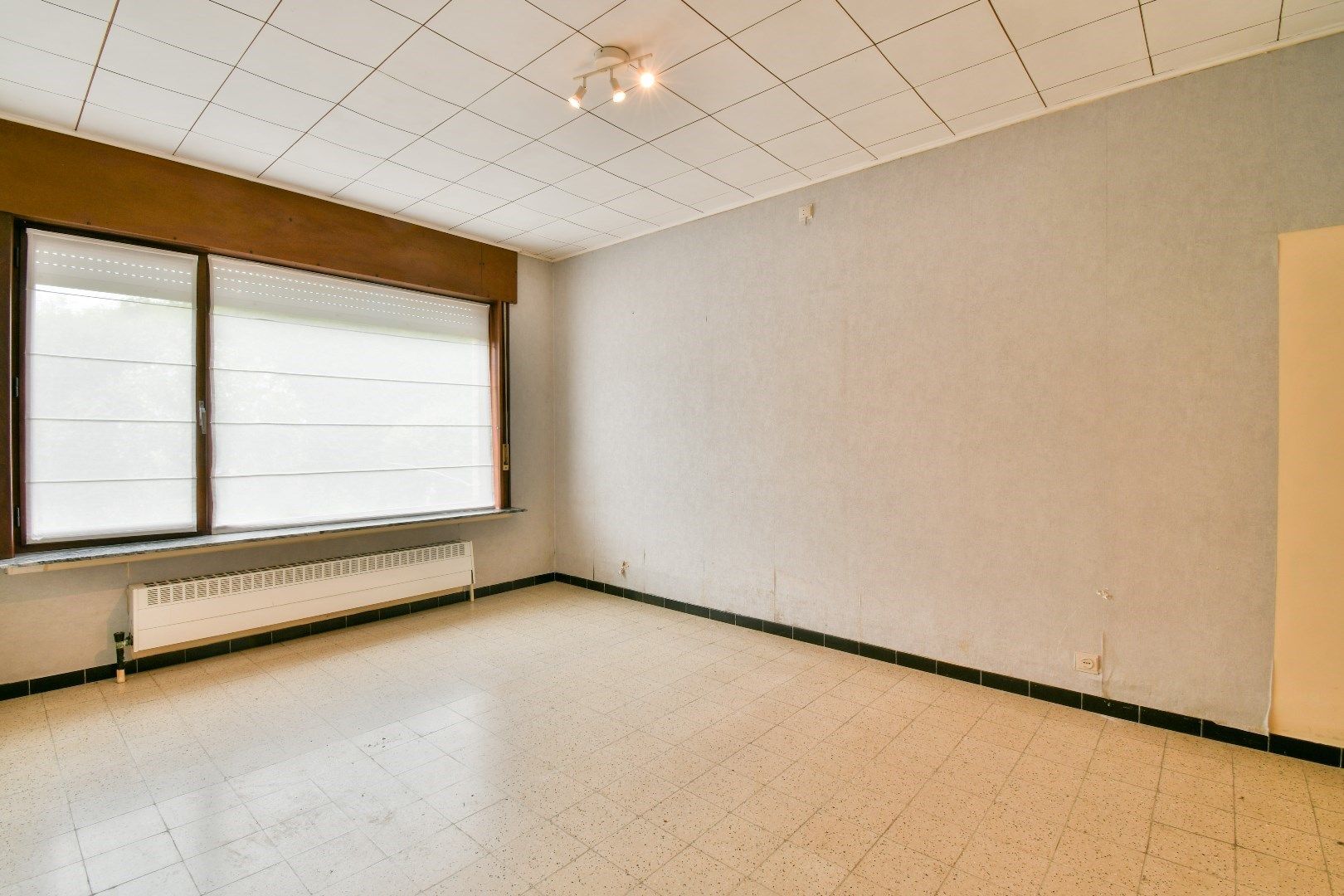 Halfopen bebouwing met renovatiepotentieel! foto 8