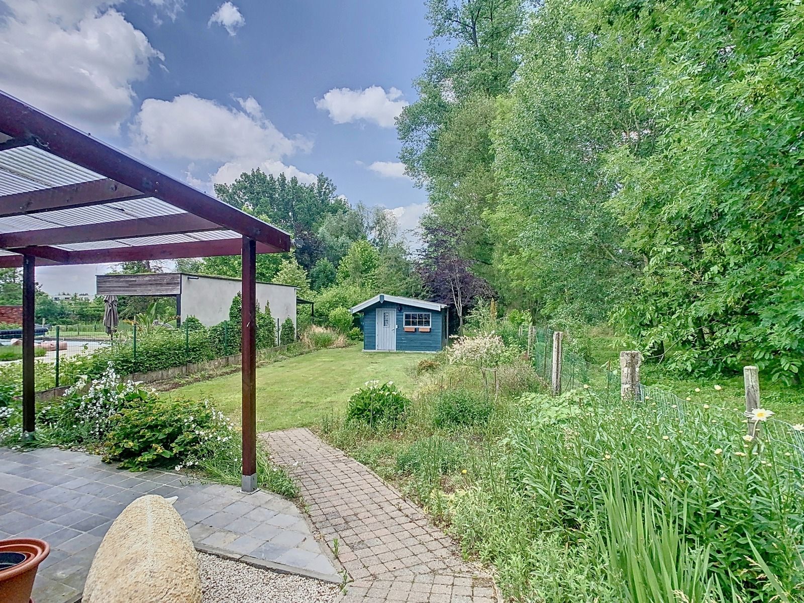 Woning met 2 SLPK, garages en riante tuin, op Toplocatie! foto 20