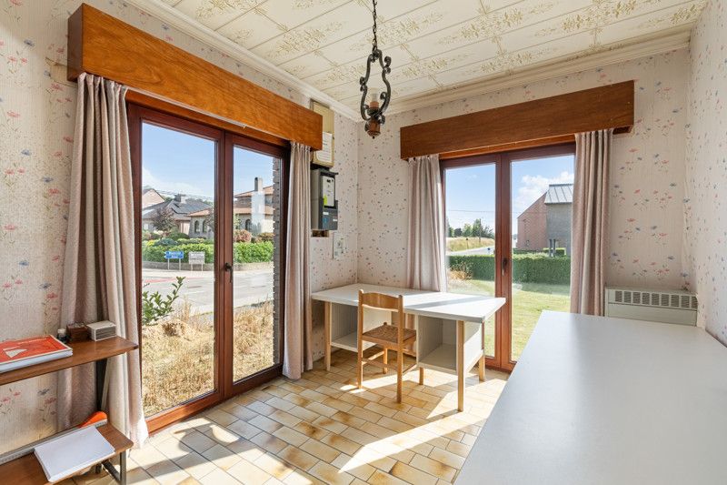 Gelijkvloerse woning met grote loods achteraan op 25are foto 6