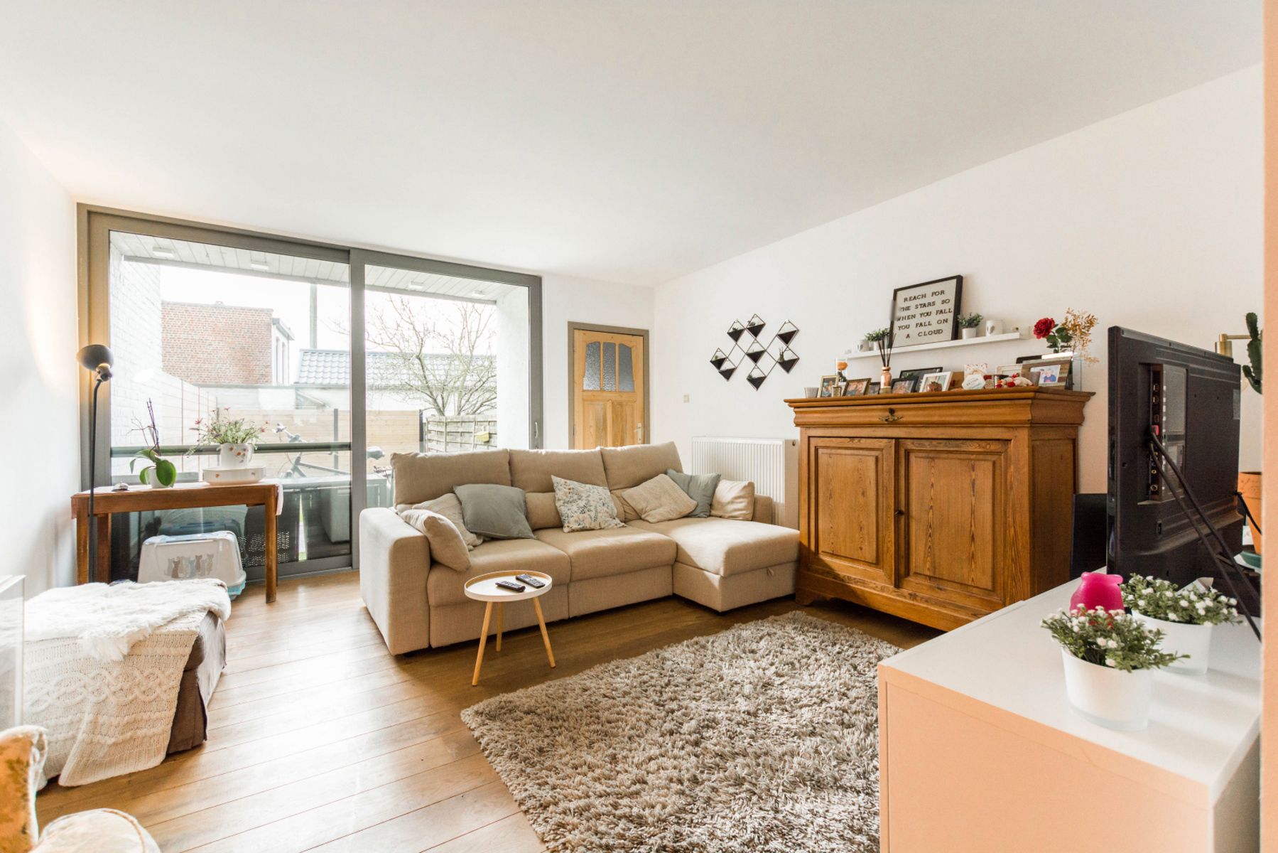 Instapklare rijwoning met 2 slaapkamers, zonneterras en tuin foto 7