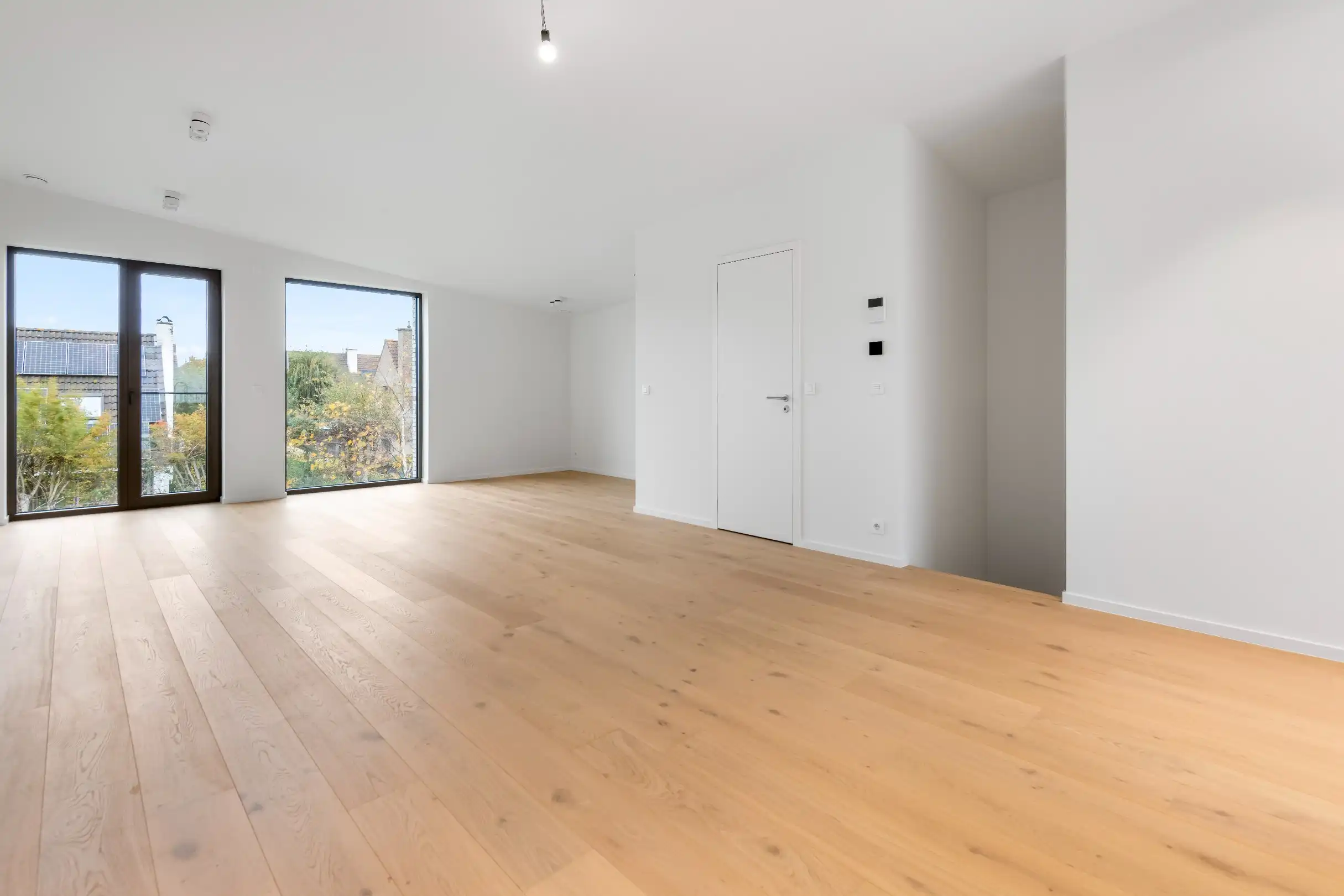 Moderne nieuwbouwwoning met ruime terrassen en ondergrondse dubbele garagebox foto 4