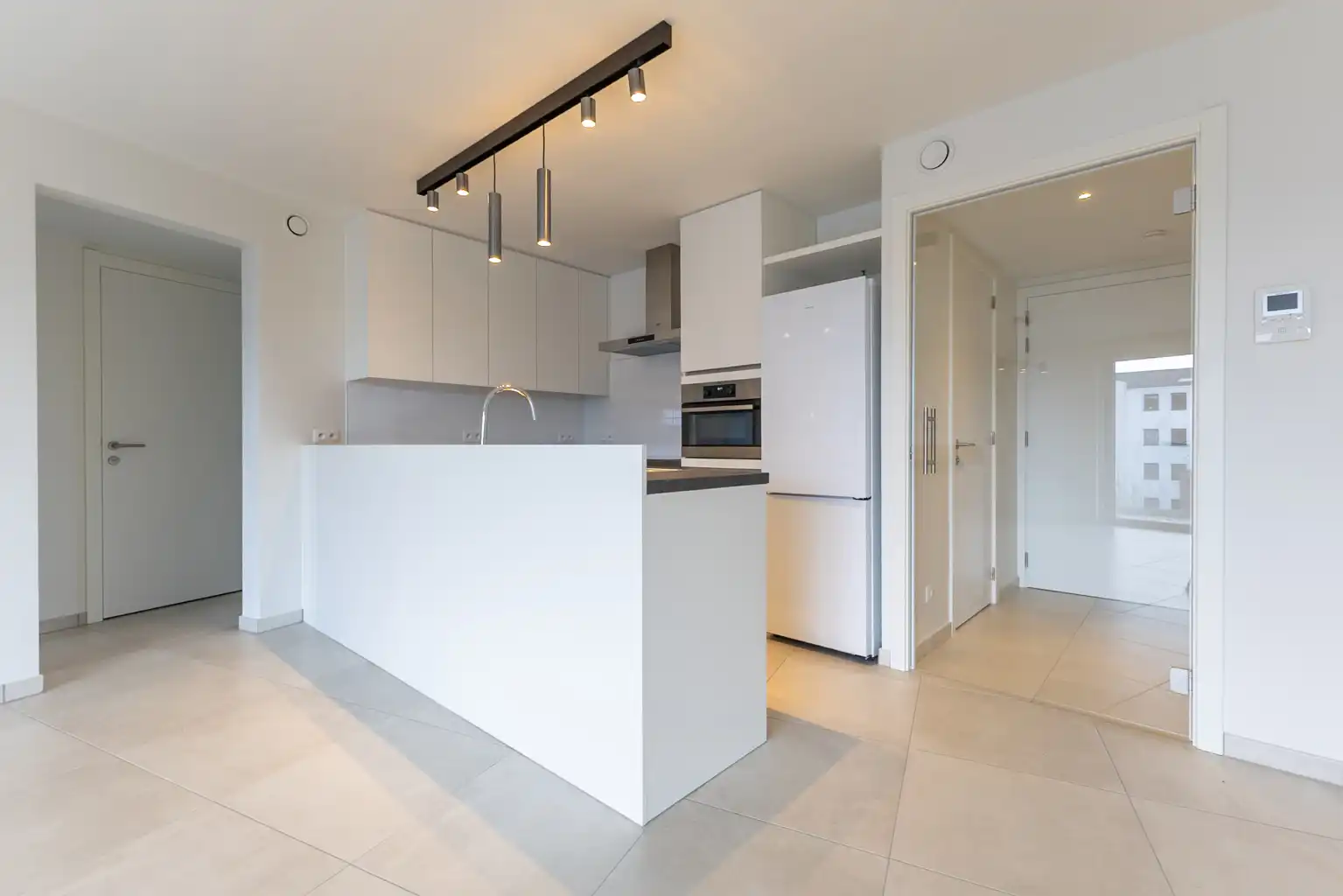 Nieuwbouwappartement met 2 slpks, bureau, kelder en terras foto 4