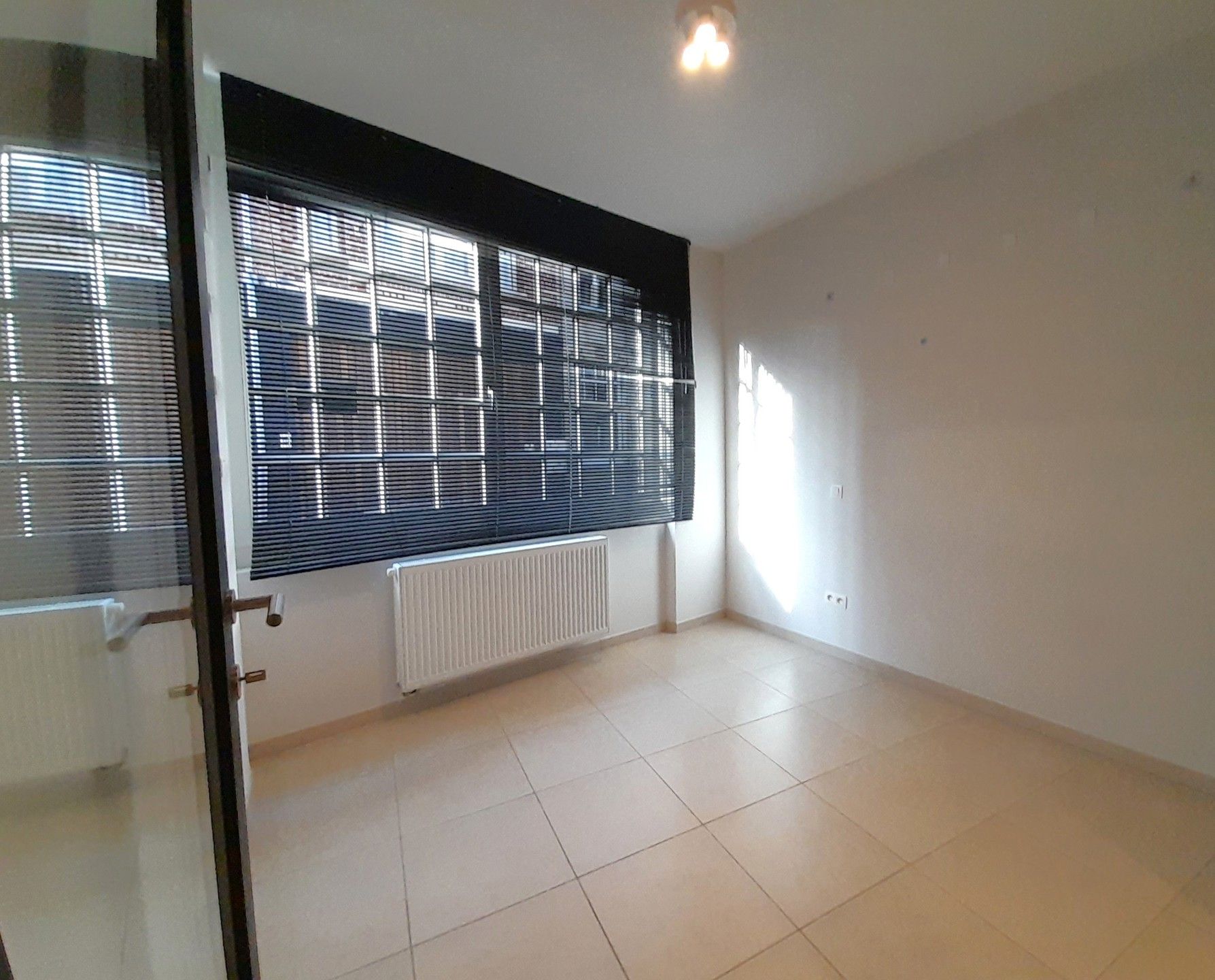 Gelijkvloers appartement / ruimte vrij beroep in hartje Lier foto 7