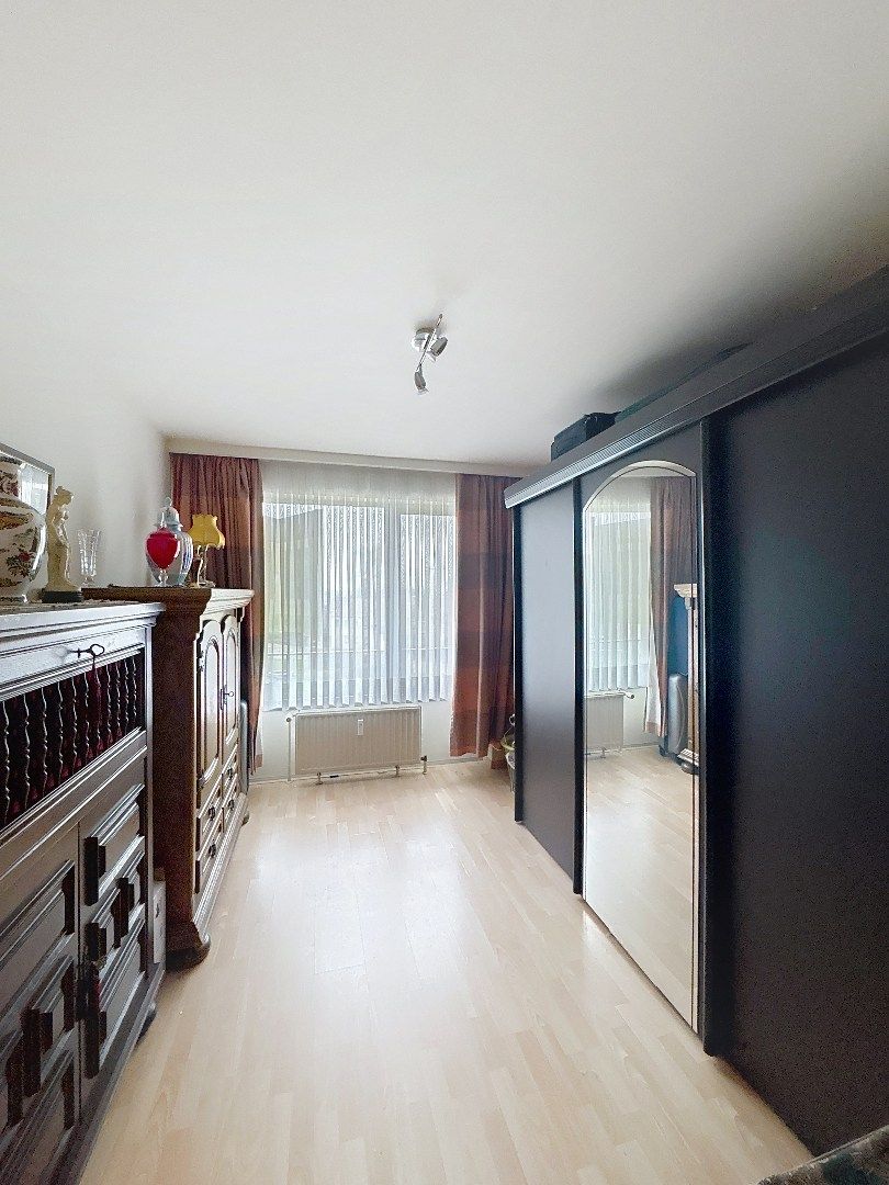 Ruim 2-slaapkamerappartement met terras, balkon, garage en berging foto 9