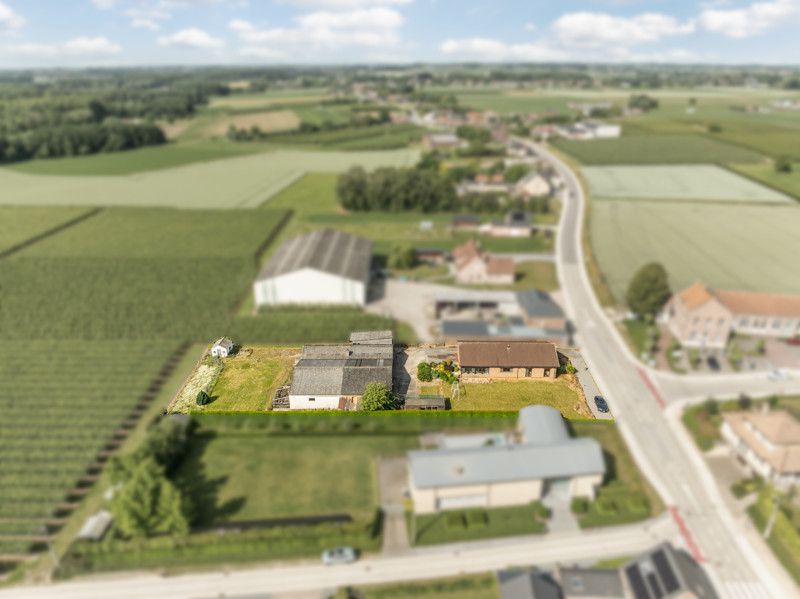 Gelijkvloerse woning met grote loods achteraan op 25are foto 37