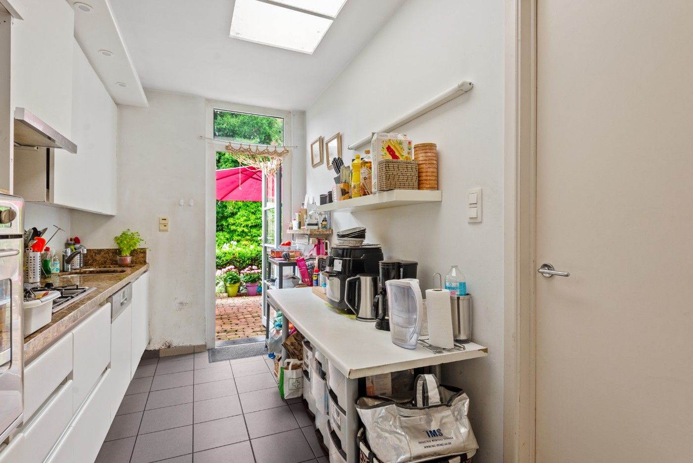 Top gelegen, instapklare woning met 2 à 3 slpk. en gezellig stadstuintje foto 9