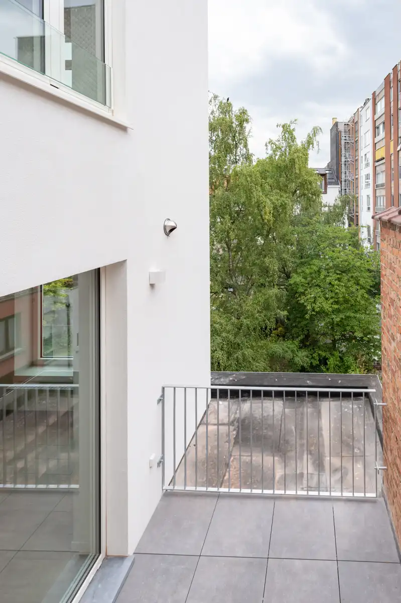 Stijlvol gerenoveerd duplex-appartement met terras foto 11