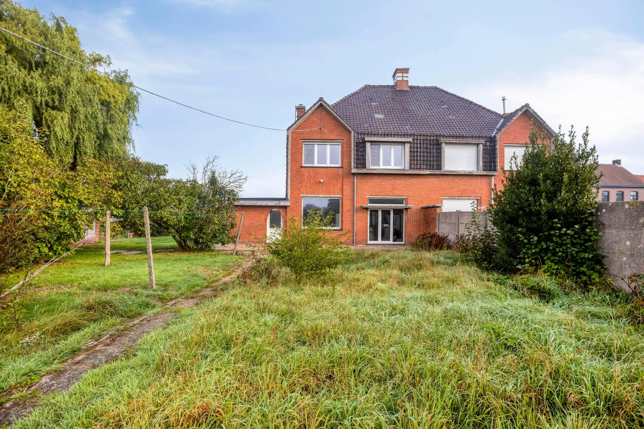Hoofdfoto van de publicatie: Halfopen bebouwing op 973 m² te koop in Abele 