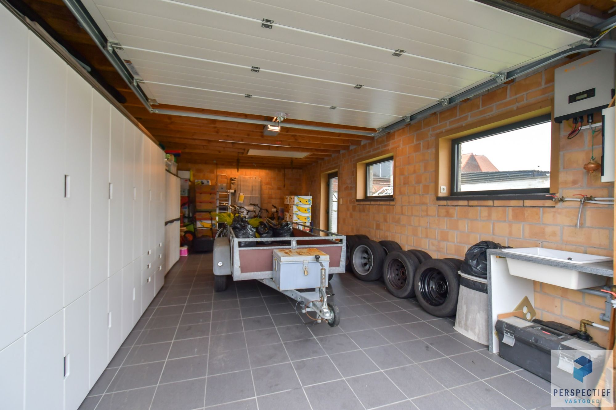 Rustig gelegen ruime halfopen woning met recent bijgebouw/garage op 454m² foto 16