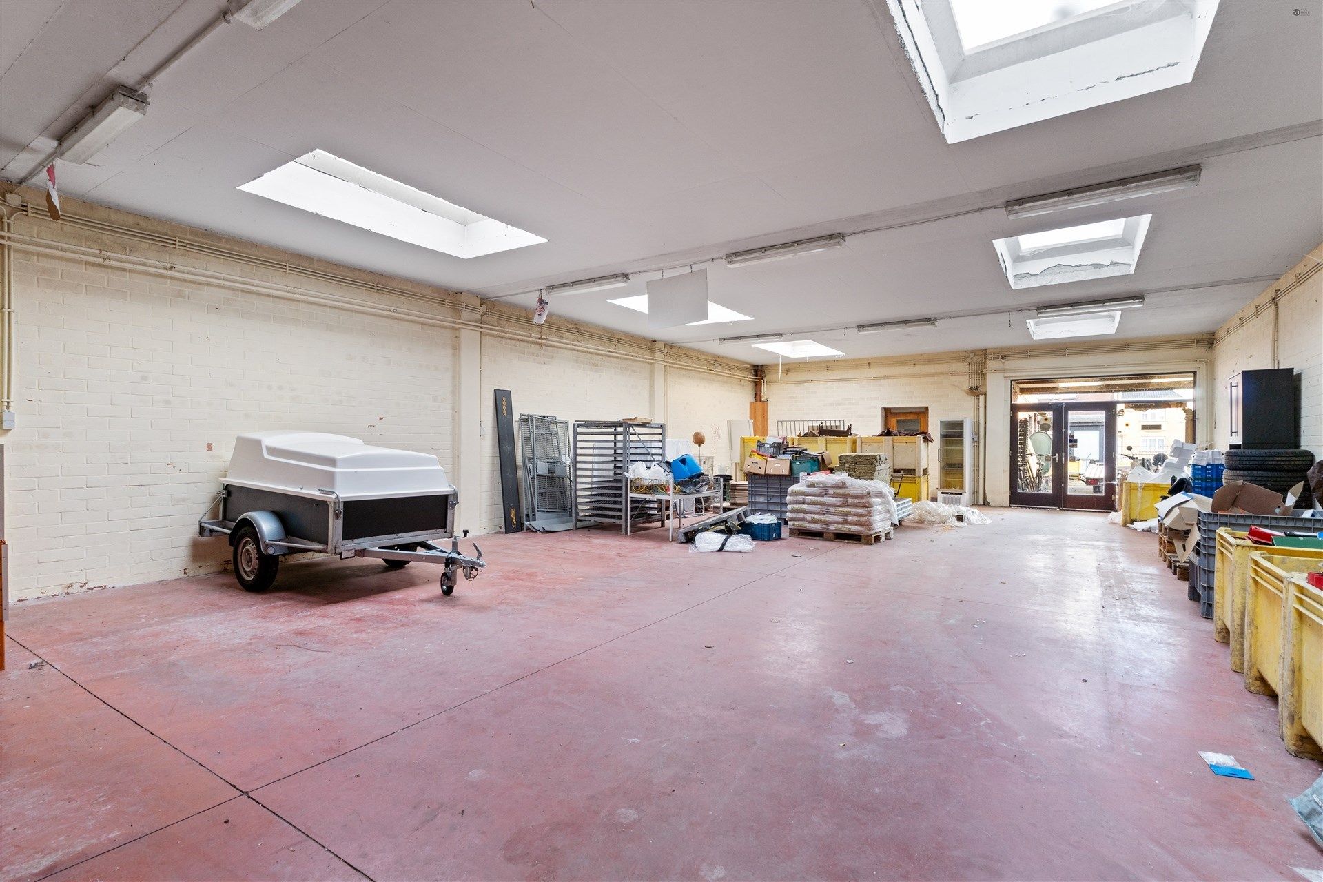 Grote grond met 2 woningen en magazijn van 700m² foto 4