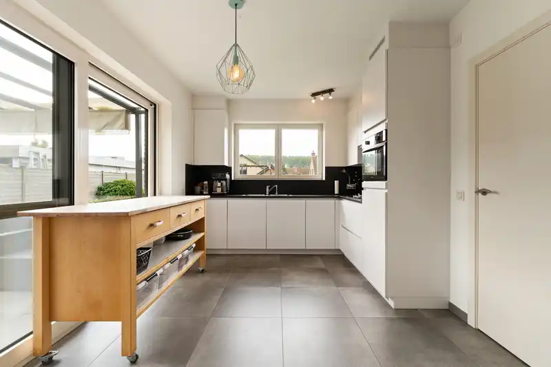 Instapklare halfopen bebouwing met zonnige tuin in Bentille foto 6