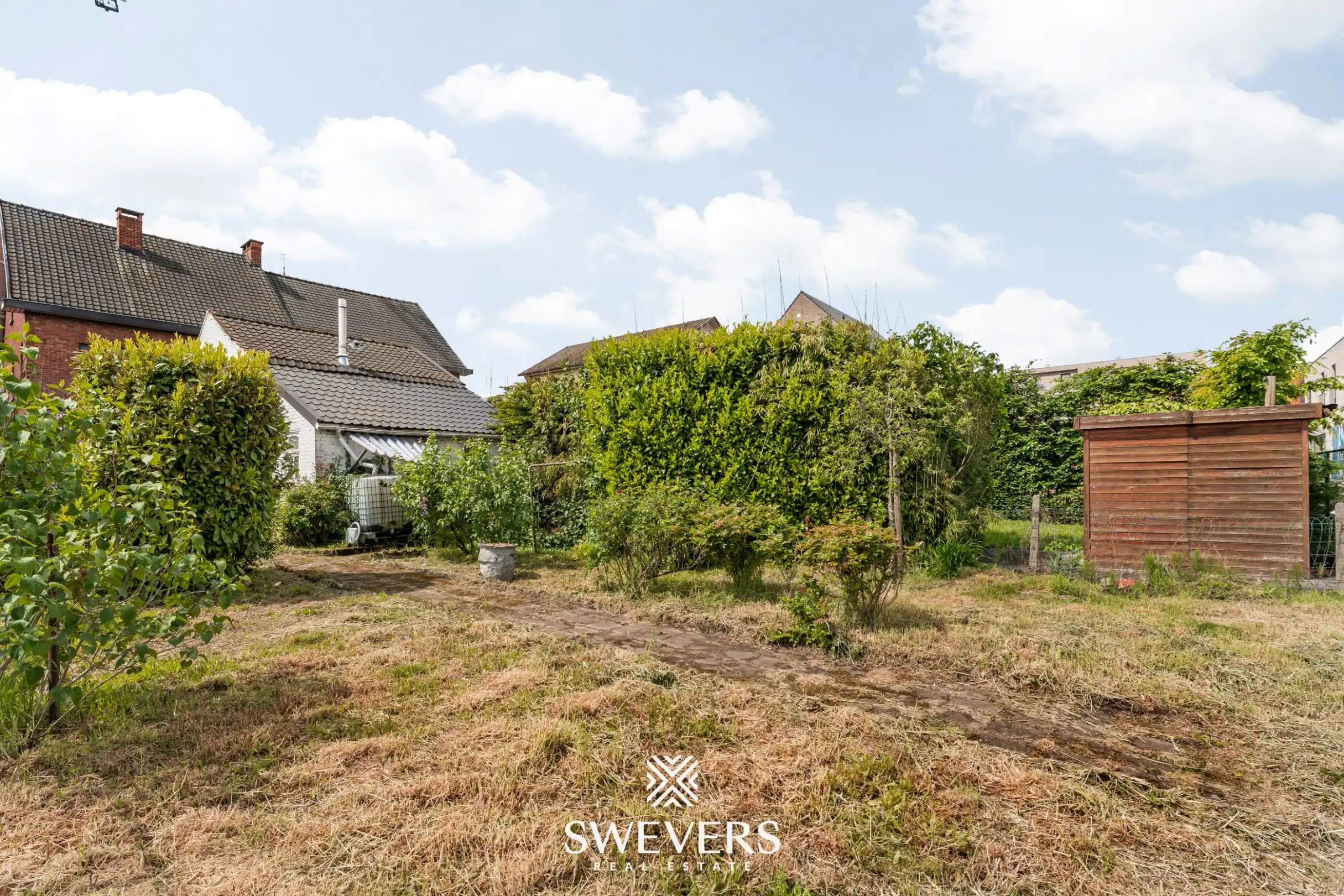Statige woning met veel potentieel in het centrum van Diepenbeek foto 25
