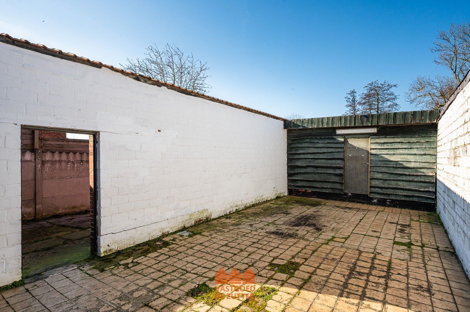 Ruime woning met handelspand in het centrum van Boekhoute foto 14