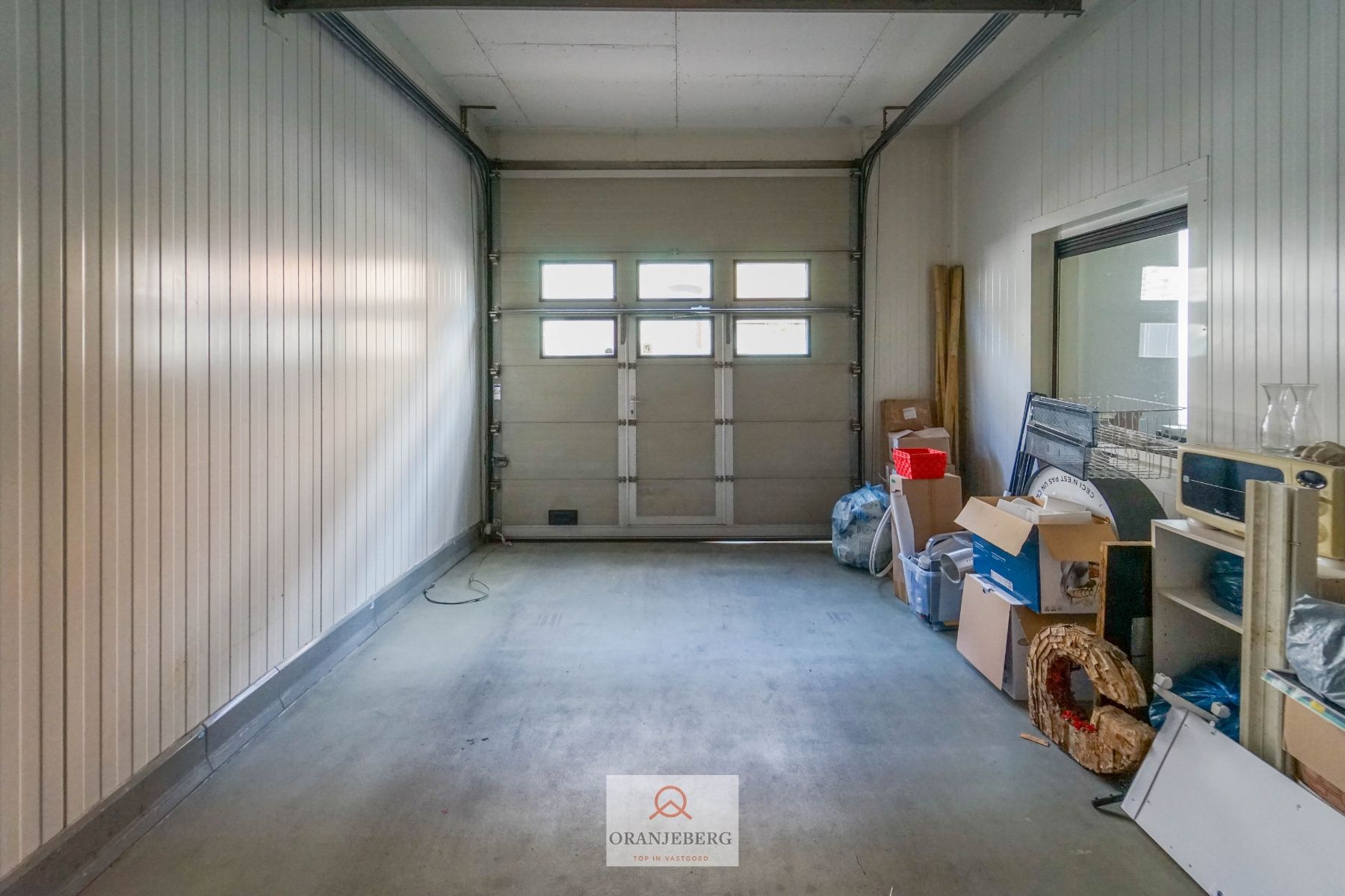 Volledig gerenoveerde winkelruimte + atelier met garage te huur in Gentbrugge foto 18