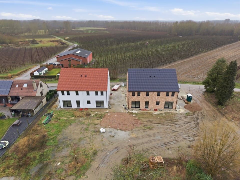 KELSBEEK - LANDELIJKE NIEUWBOUWWONINGEN NABIJ HET CENTRUM VAN SINT-TRUIDEN foto {{pictureIndex}}