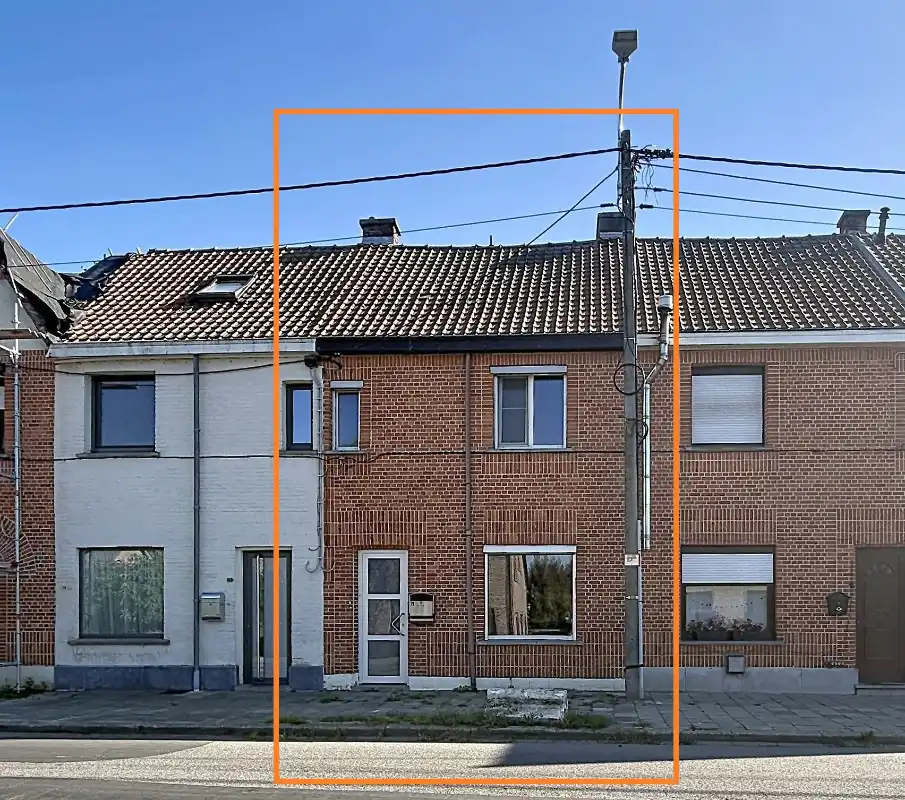 Rijwoning met 3 slaapkamers en uitweg foto {{pictureIndex}}