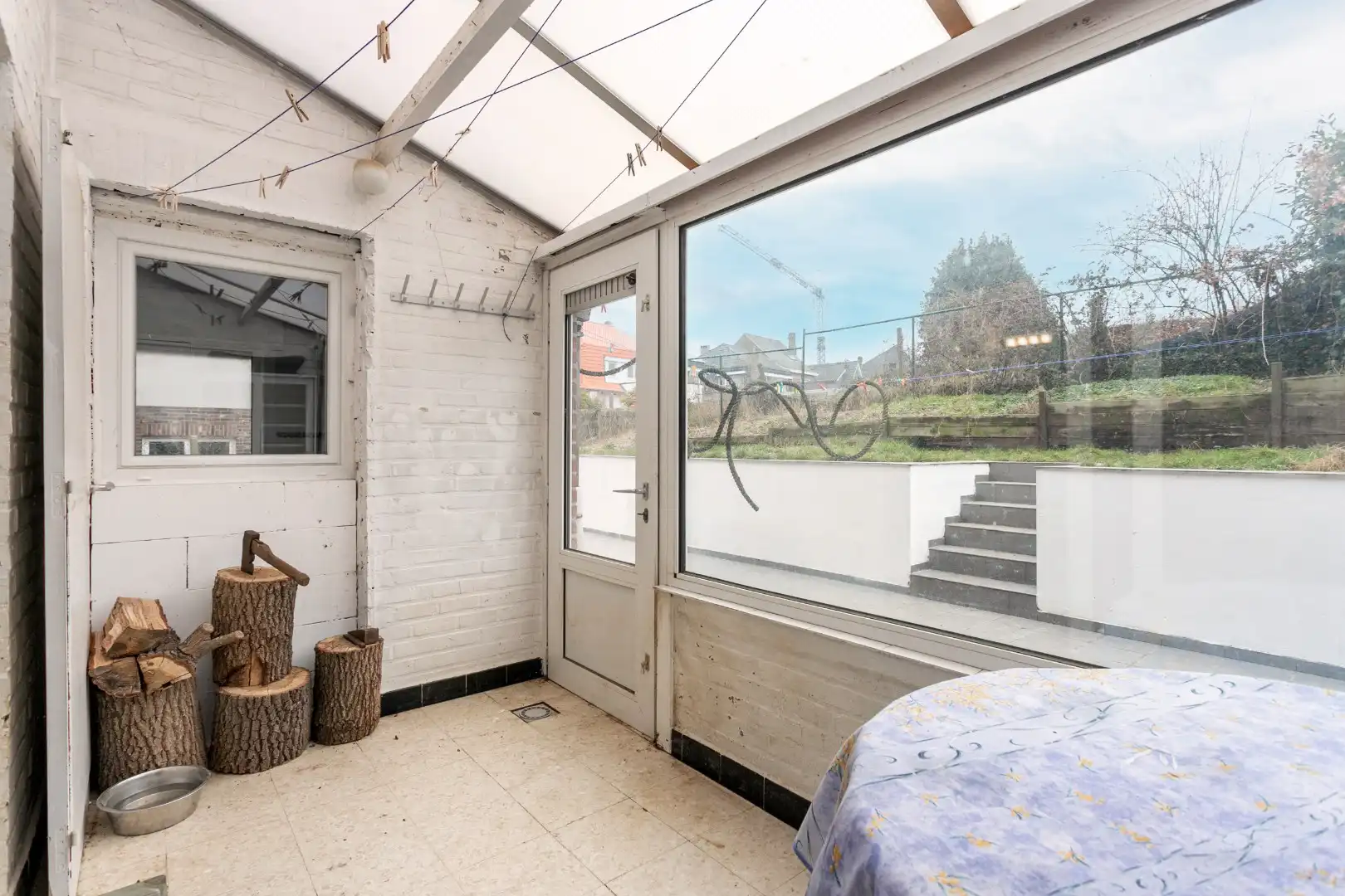 Solide woning met 3 slpks, tuin en garage te Buizingen foto 9