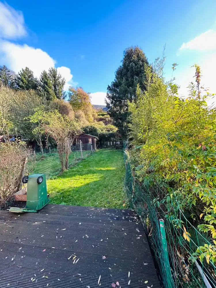 Knusse, instapklare gezinswoning met tuin foto 10