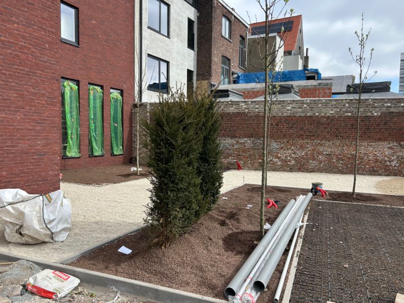 Moderne lichtrijke studentenkamer in een nieuwbouwproject op een top locatie in centrum Kortrijk met zicht op plein. foto 11