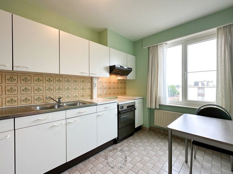 Instapklaar appartement met twee slaapkamers, terras en optionele garagebox in Sint-Niklaas foto 7