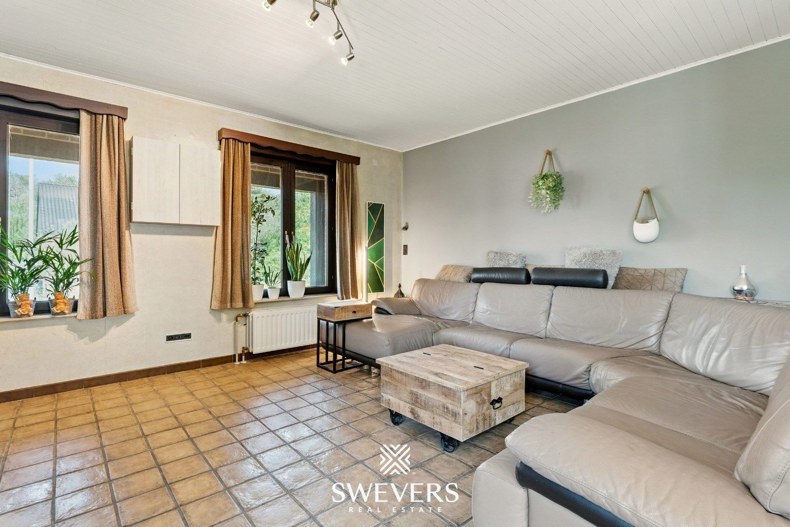 Ruime gezinswoning met zonnepanelen, kelder en zonnige tuin op topligging foto 5