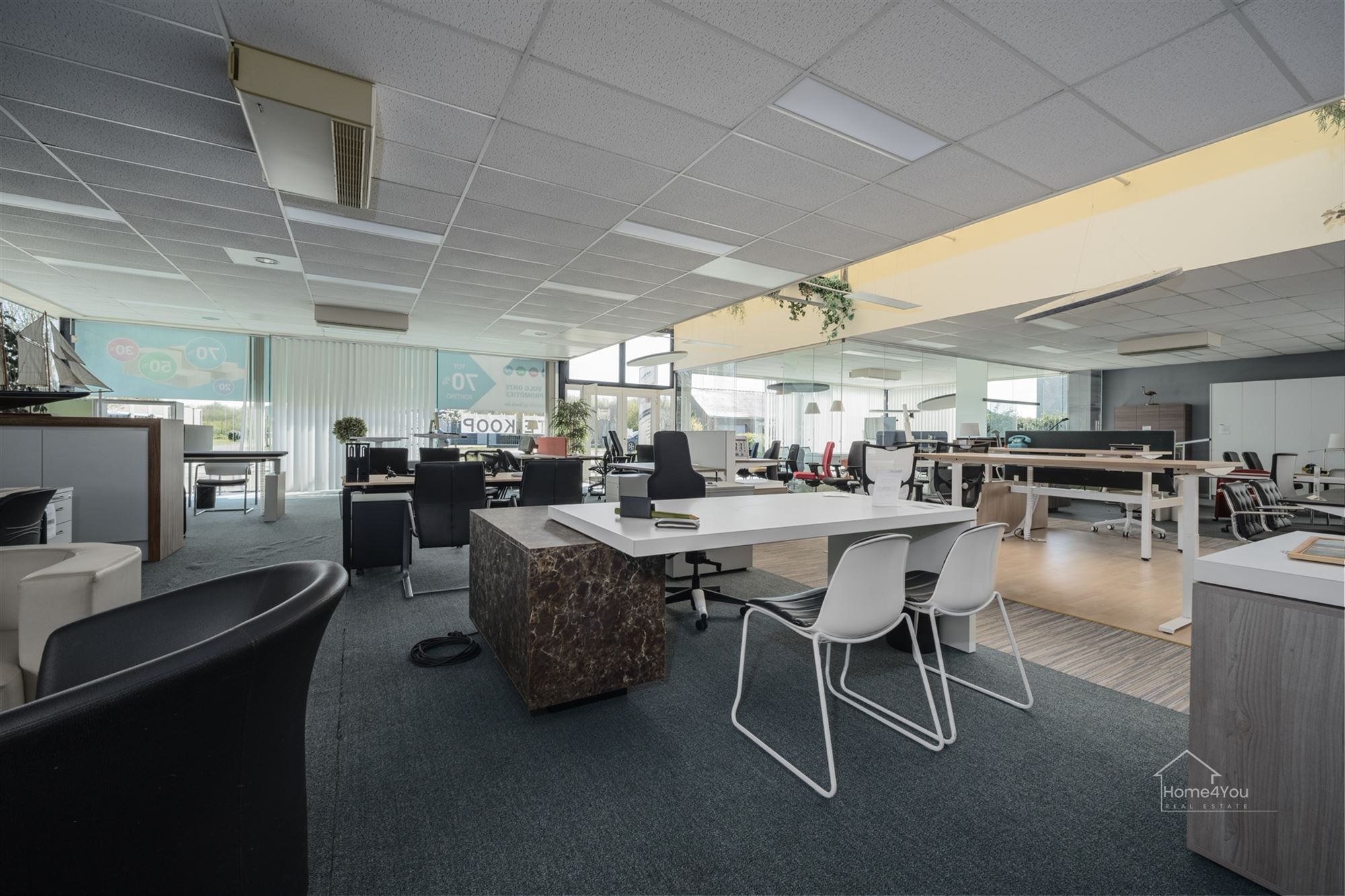  Multifunctioneel bedrijfsgebouw met toonzaal, magazijn, kantoren én woonst op toplocatie. foto 4
