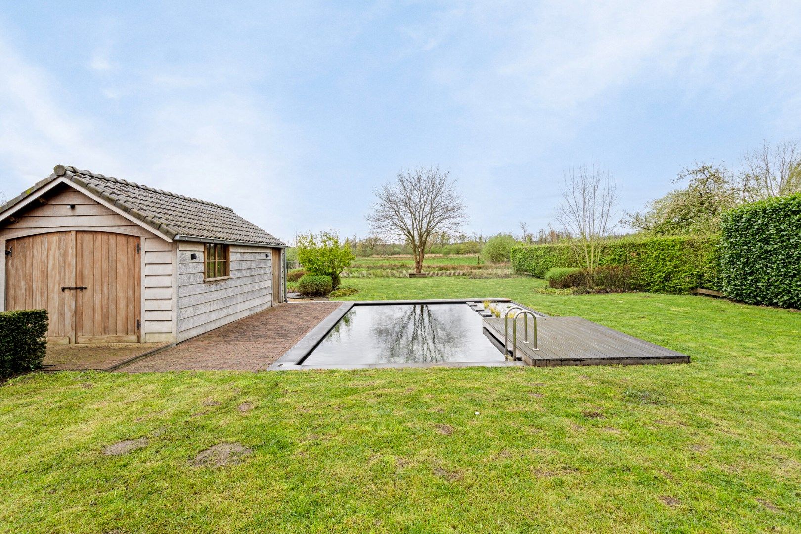 Ruim ingedeelde kwalitatieve villa op 12 are met adembenemd zicht op achterliggend groen. foto 42