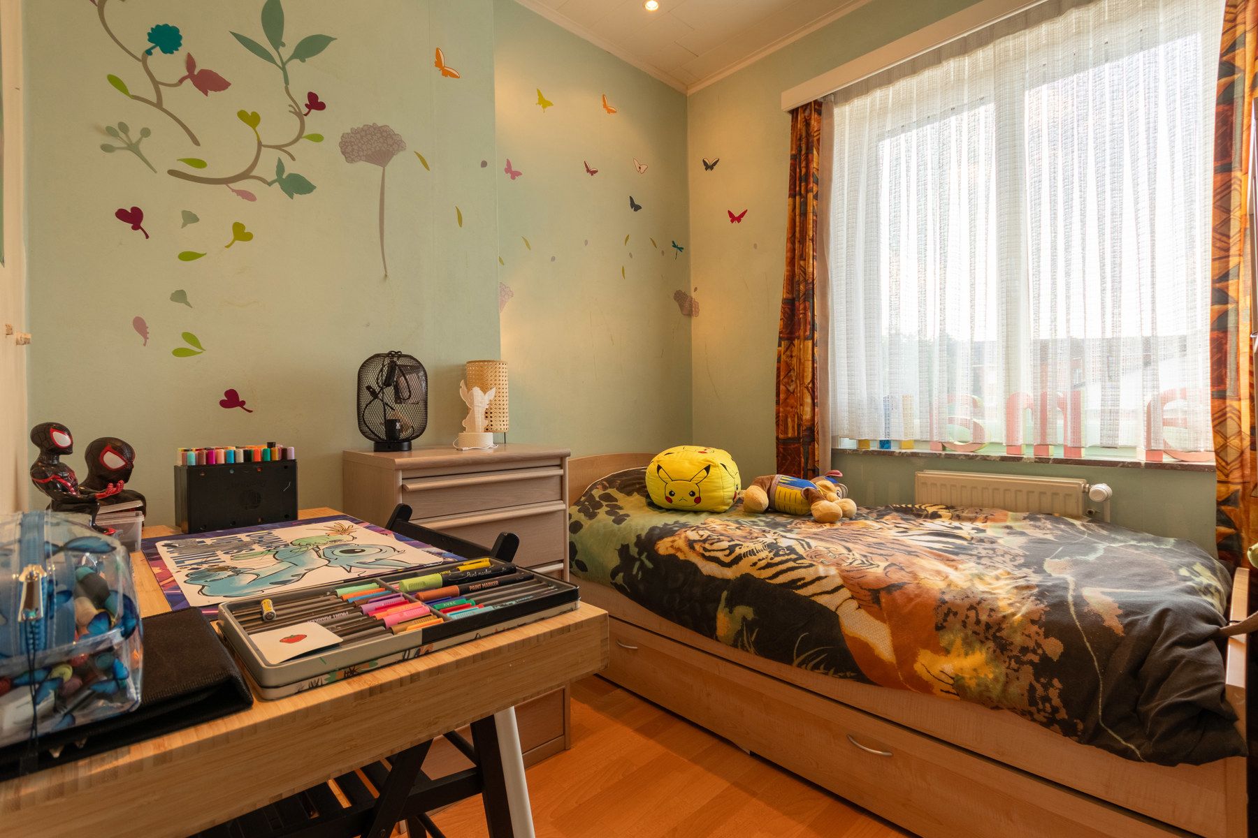 Goed onderhouden woning met 4 slaapkamers en leuke tuin foto 10