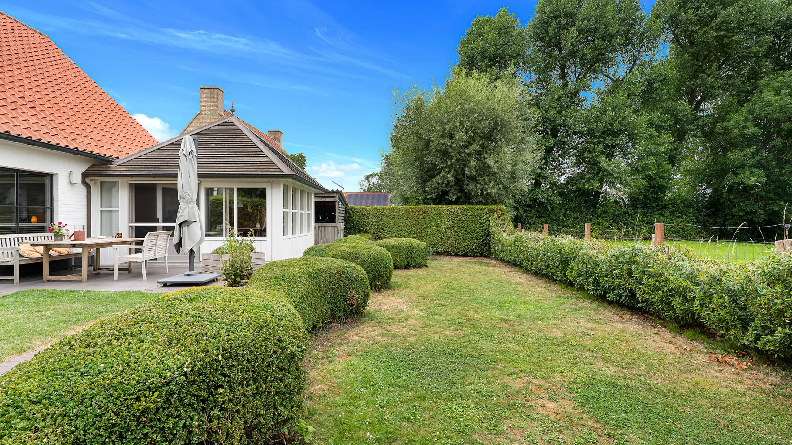 Vrijstaande woning met open zichten over de Damse polders foto 15