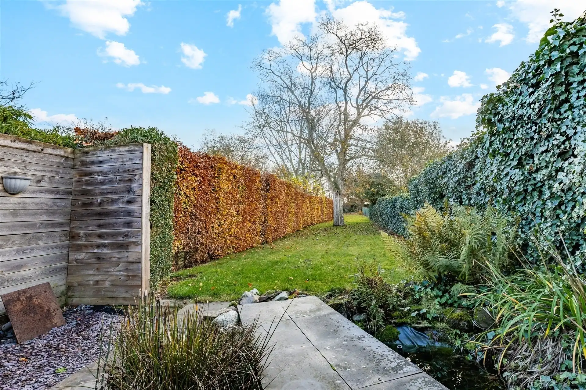 Gezellige rijwoning met uitzonderlijke grote tuin in hartje Schellebelle foto 3