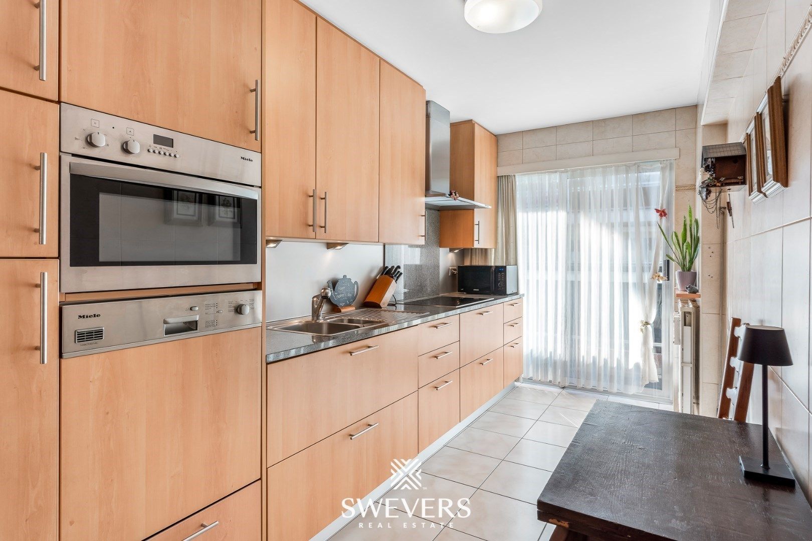 Instapklaar 3-slpkr appartement (EPC: B) met zonnig terras (20m²) en dubbele garagebox nabij centrum Hasselt foto 8