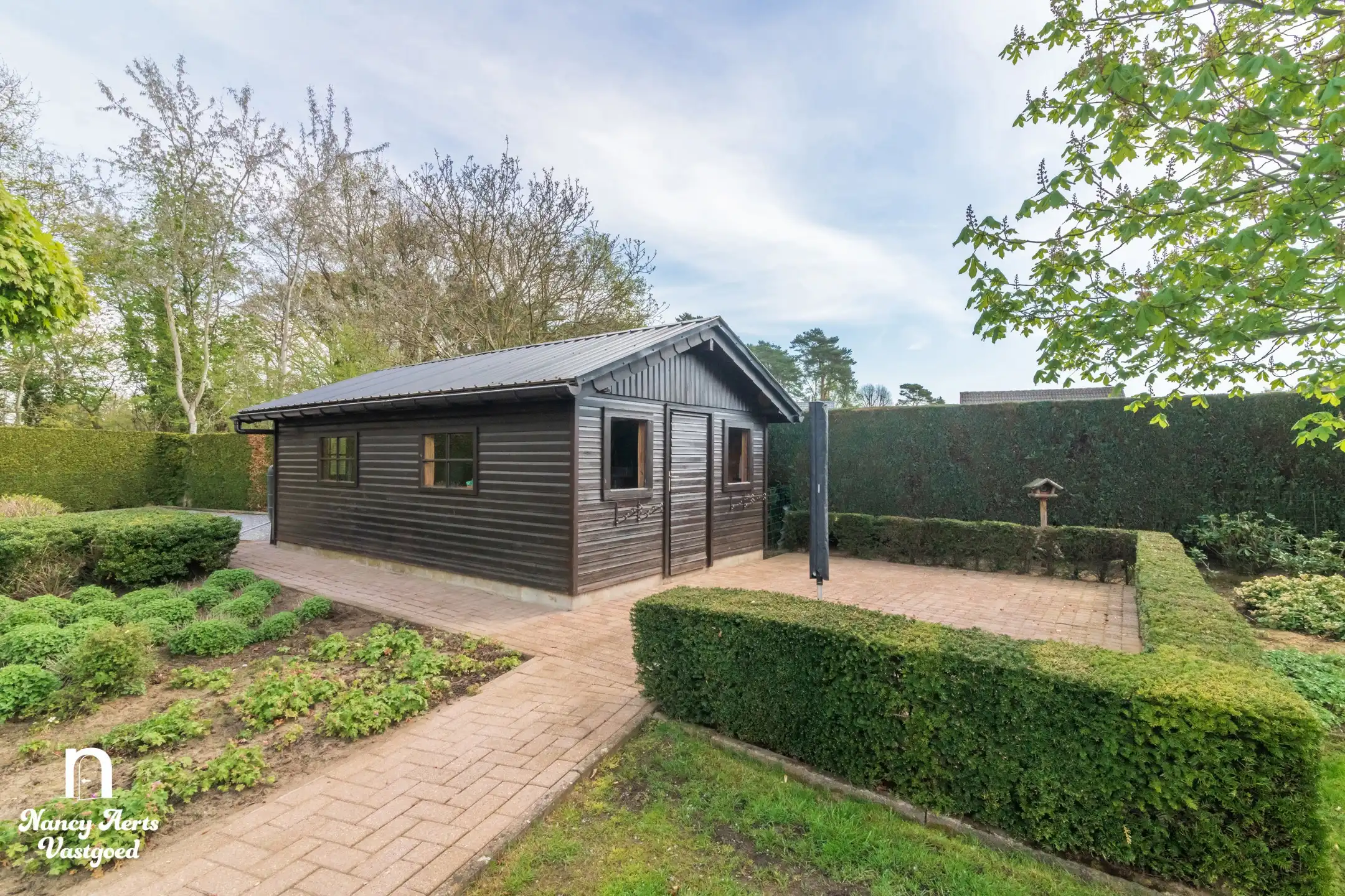 Lichtrijke woning met prachtige tuin en groeipotentieel foto 26