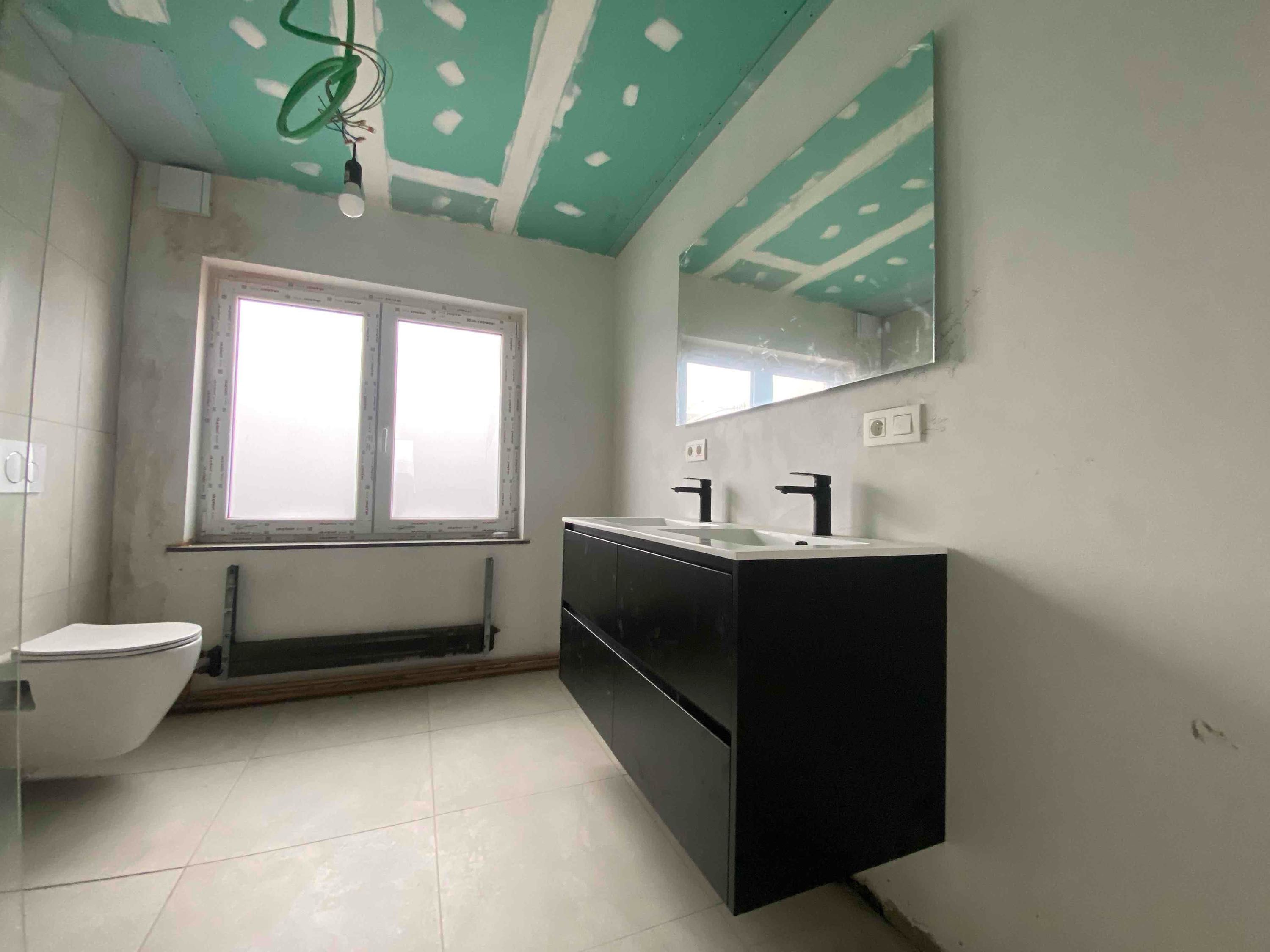 Volledig vernieuwe woning met tuin foto 7