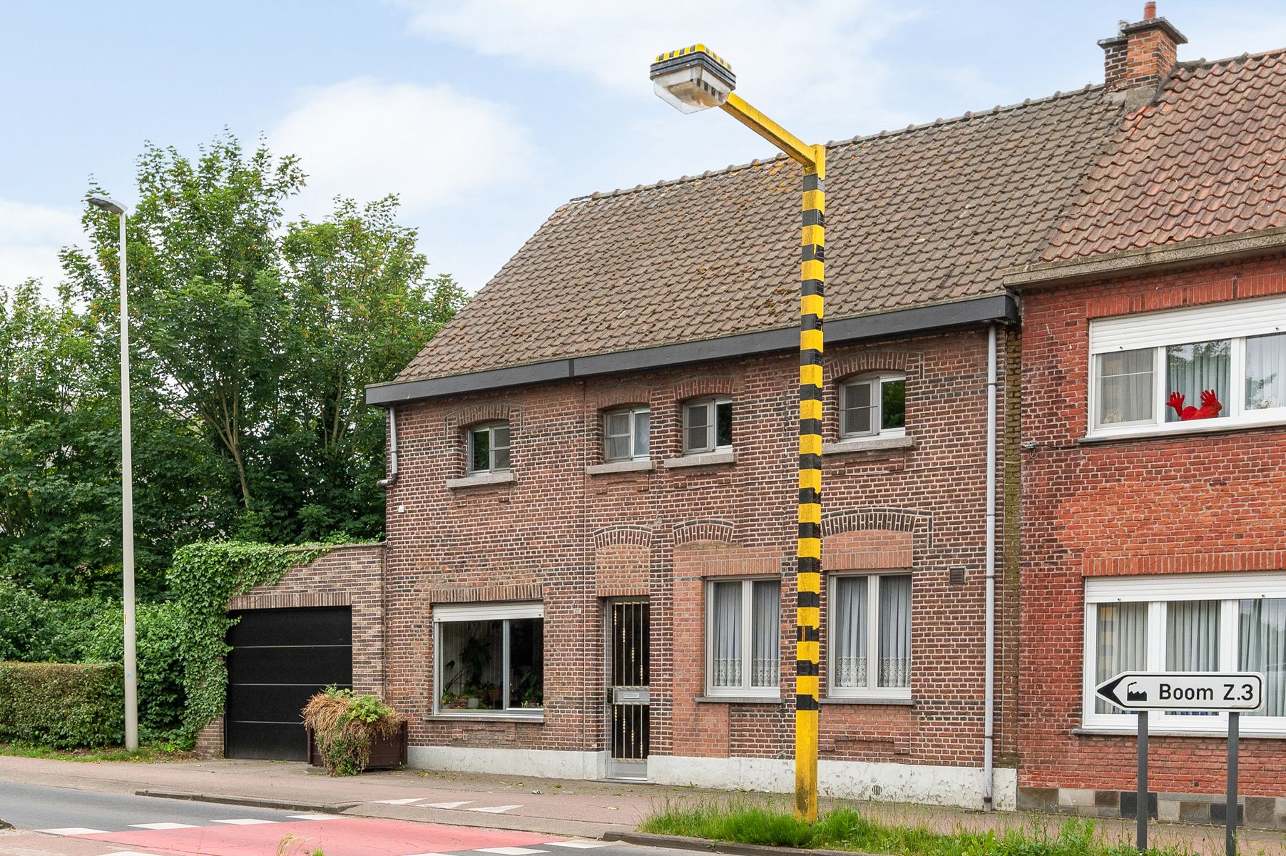 Gezinswoning met 4 slaapkamers, koele Z-tuin en garage in het hart van Boom foto 28