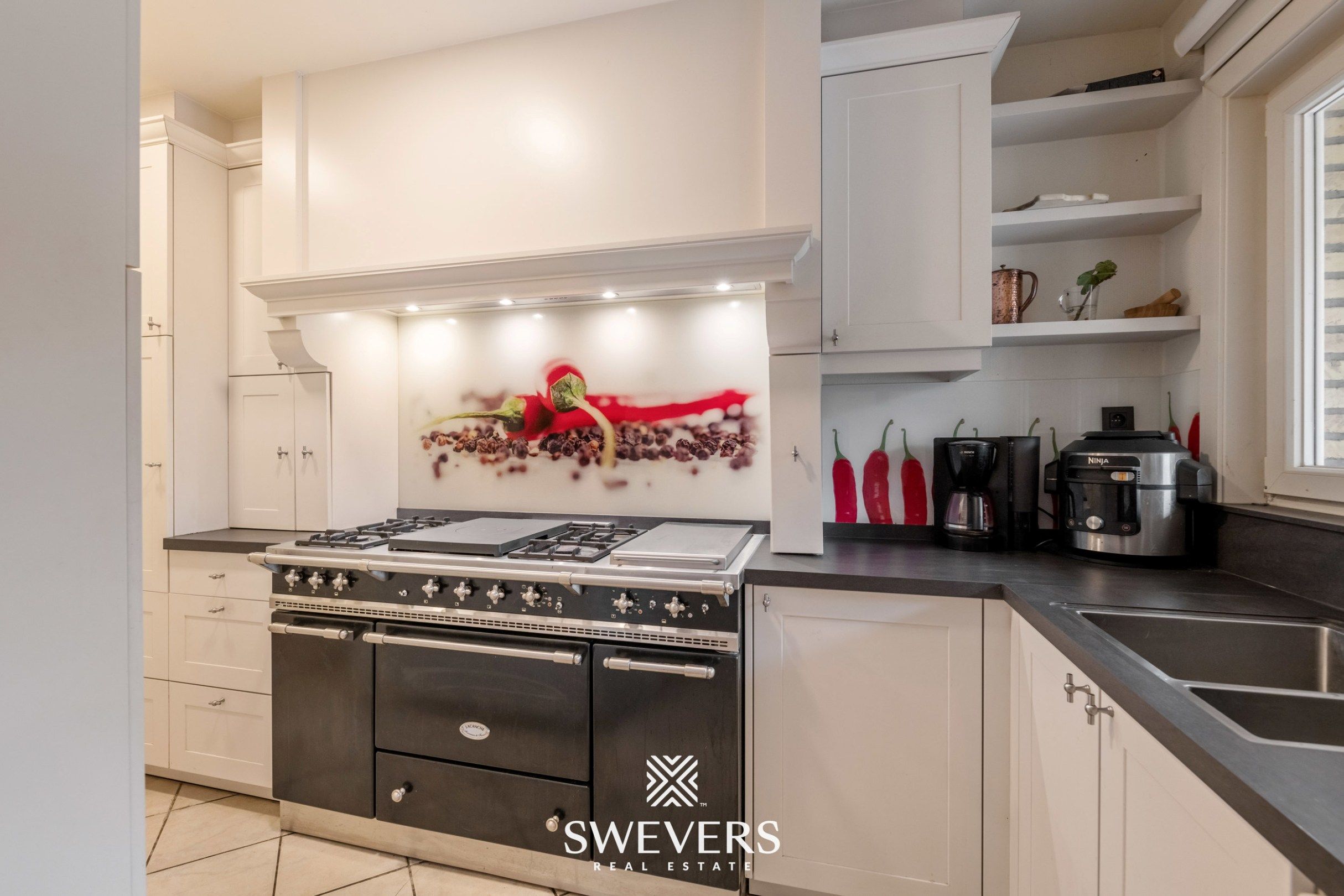 Instapklare gezinswoning met 3 slaapkamers, ruime kelder en zuidgerichte tuin in Beringen foto 11