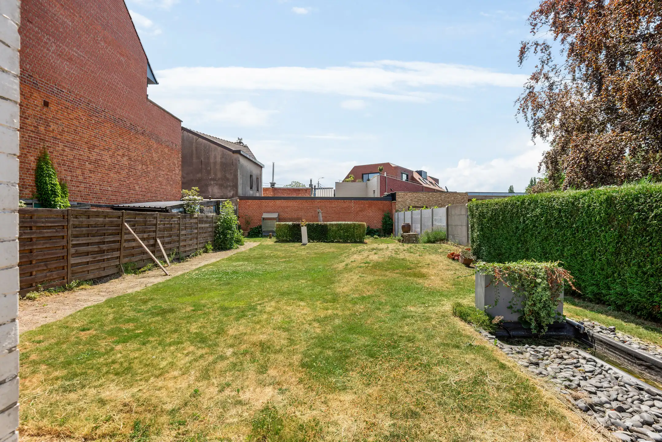 Op een topligging gelegen ruime gezinswoning met zonnige tuin en dubbele garage.  foto 17