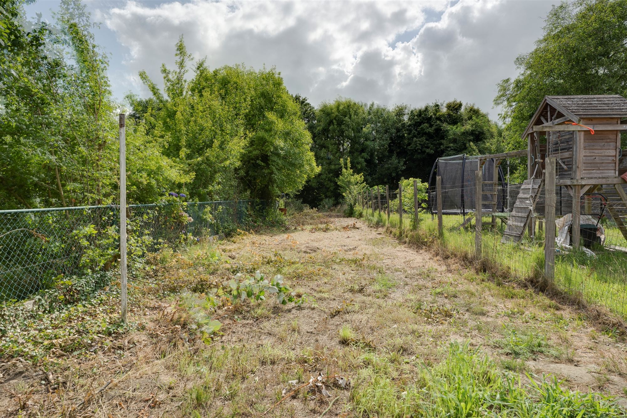 Instapklare eengezinswoning met zonnige tuin omringd door rust foto 10