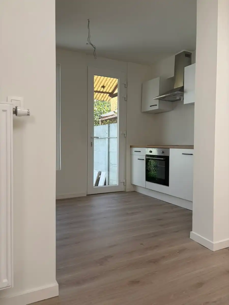 Een frisse start in een huis met karakter, tuin én garage! foto 4
