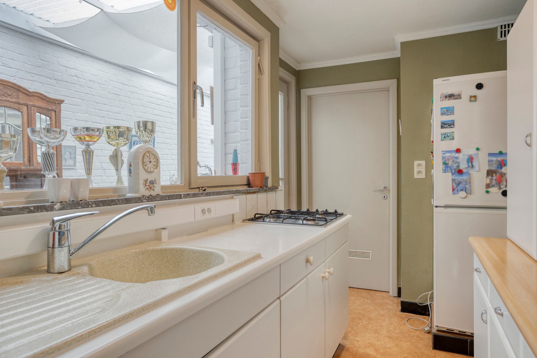 Te renoveren stadswoning met 3 slaapkamers en tuin! foto 8