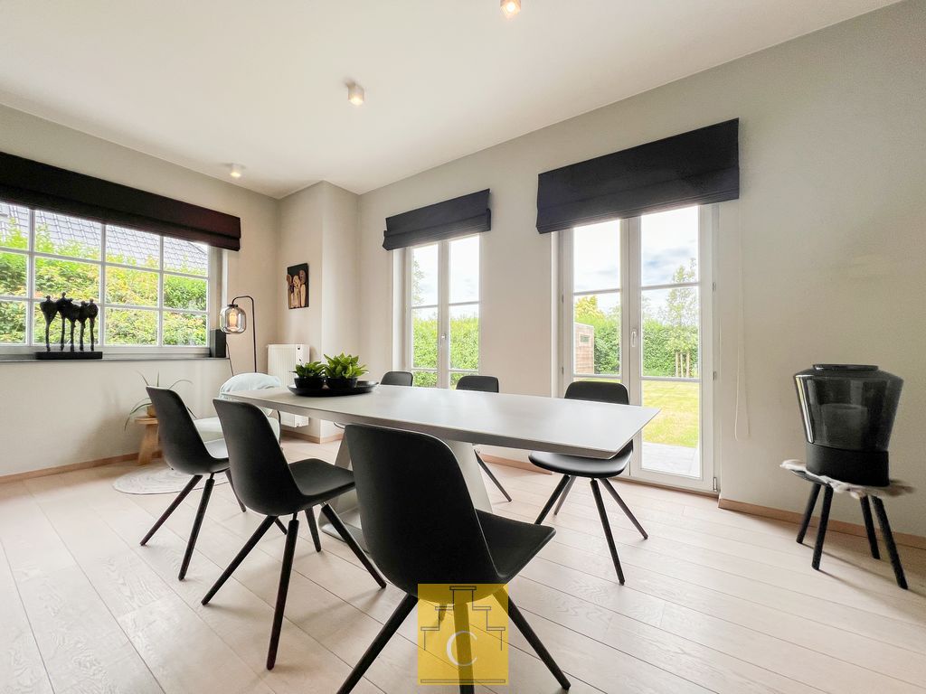 instapklare half open woning met garage en zonnige tuin foto 3