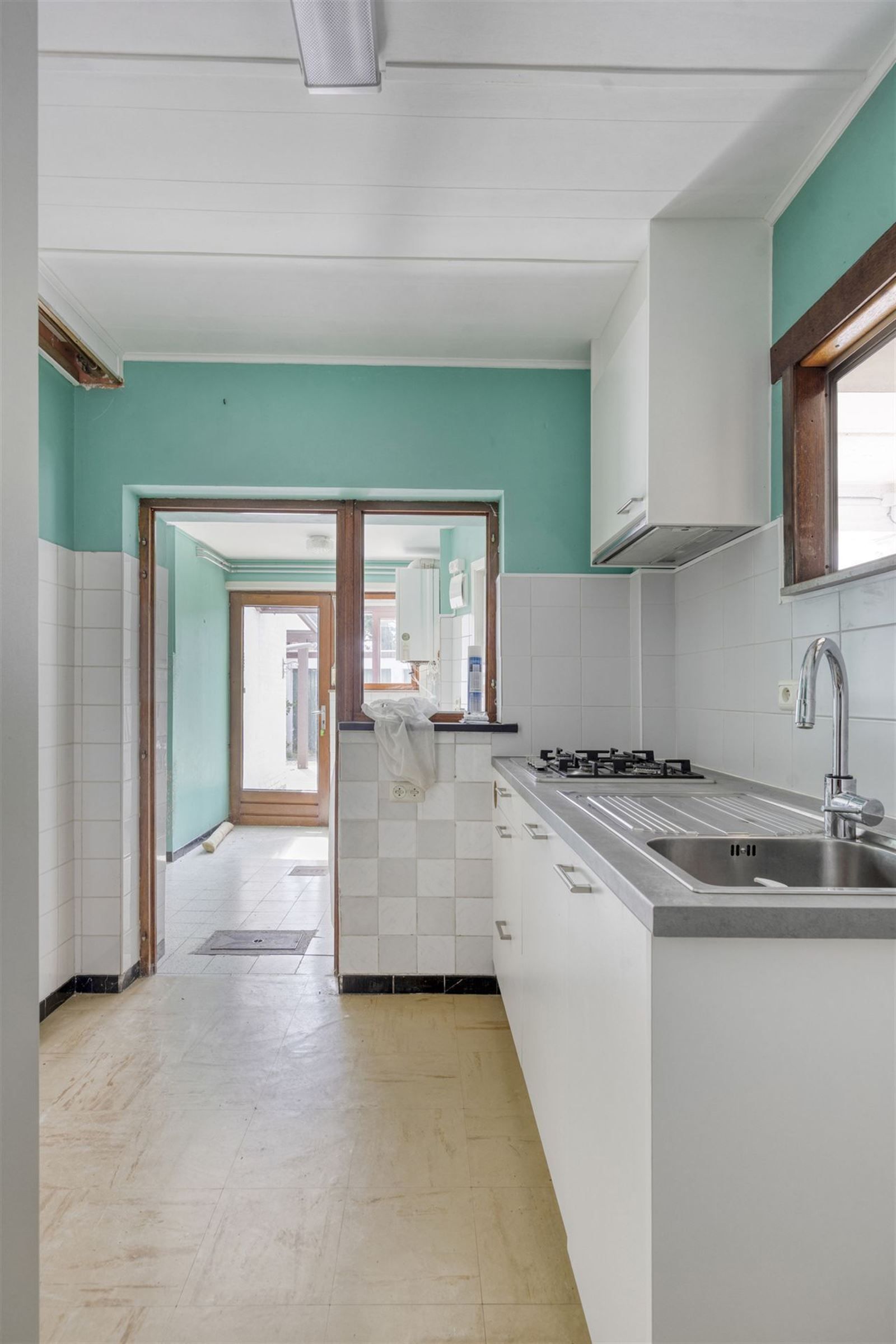 Opbrengstwoning met 2 appartementen en 3 garageboxen foto 12