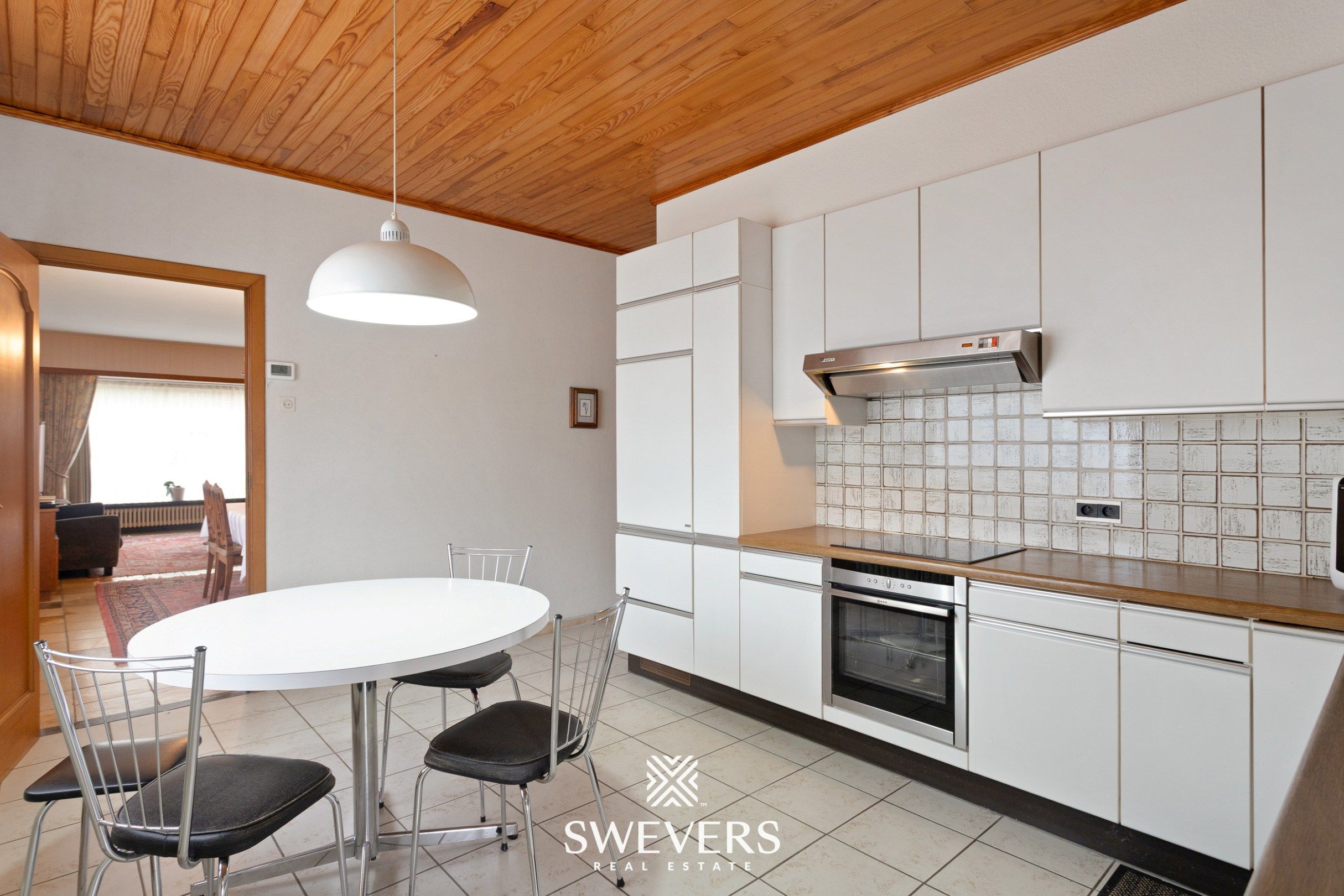 Open bebouwing met 4 slaapkamers, kelder en tuin in rustige, doodlopende straat foto 9