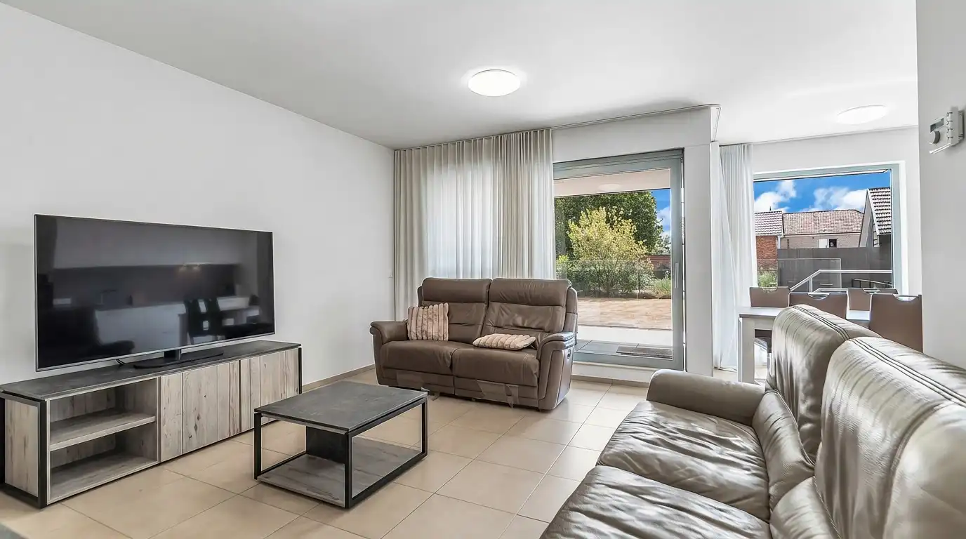 Instapklaar en energiezuinig appartement met 2 slaapkamers en 2 ondergrondse autostaanplaatsen foto 5