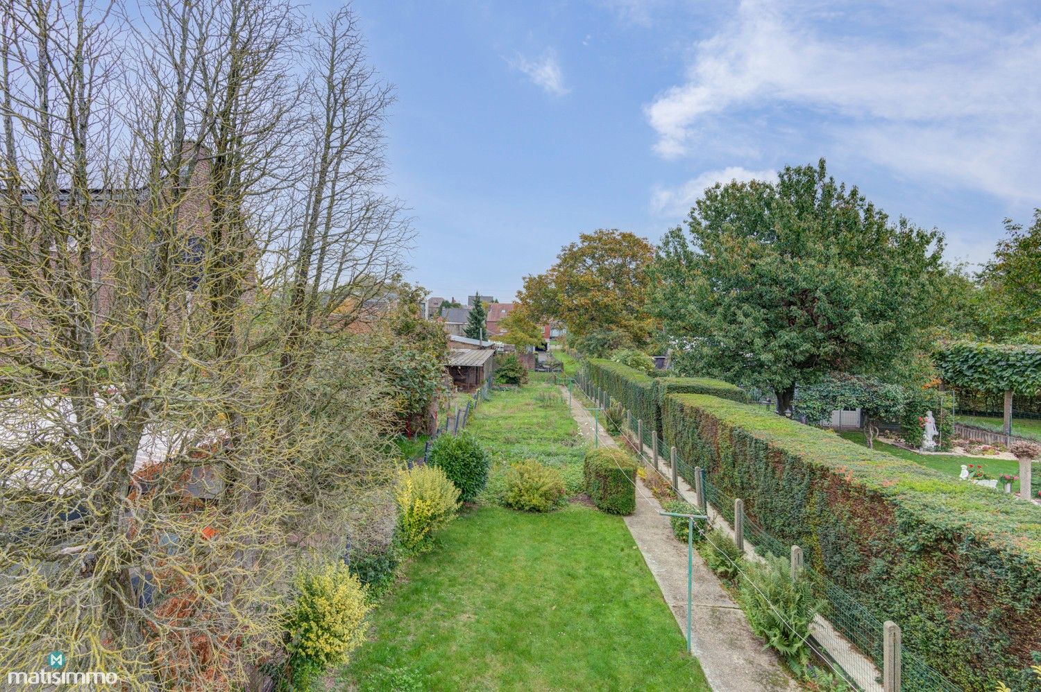 GEZINSWONING MET RUIME TUIN EN DRIE SLAAPKAMERS IN MARTENSLINDE foto 31