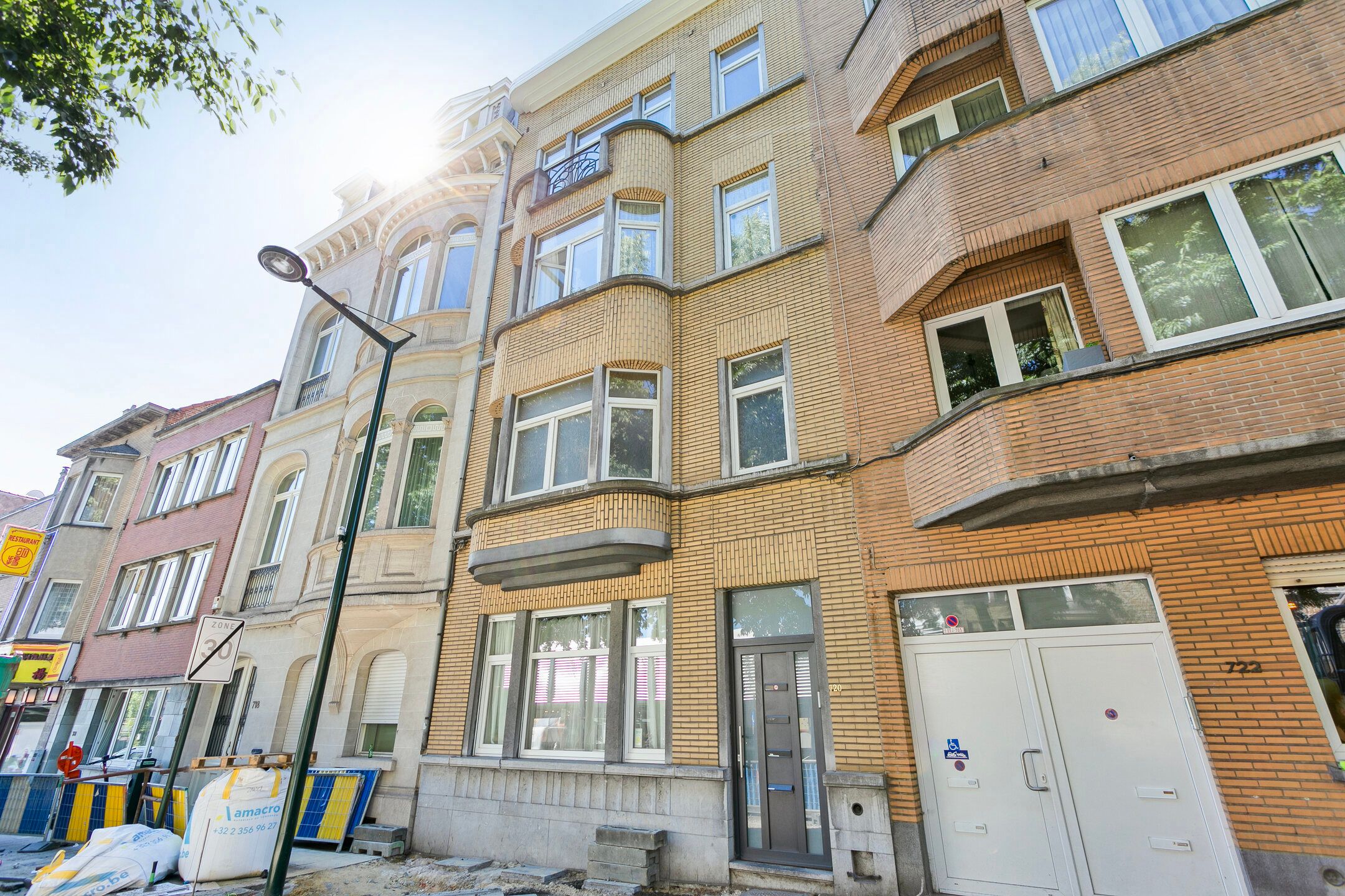 Opbrengstgebouw van 4 appartementen op de grens met Wemmel foto 1