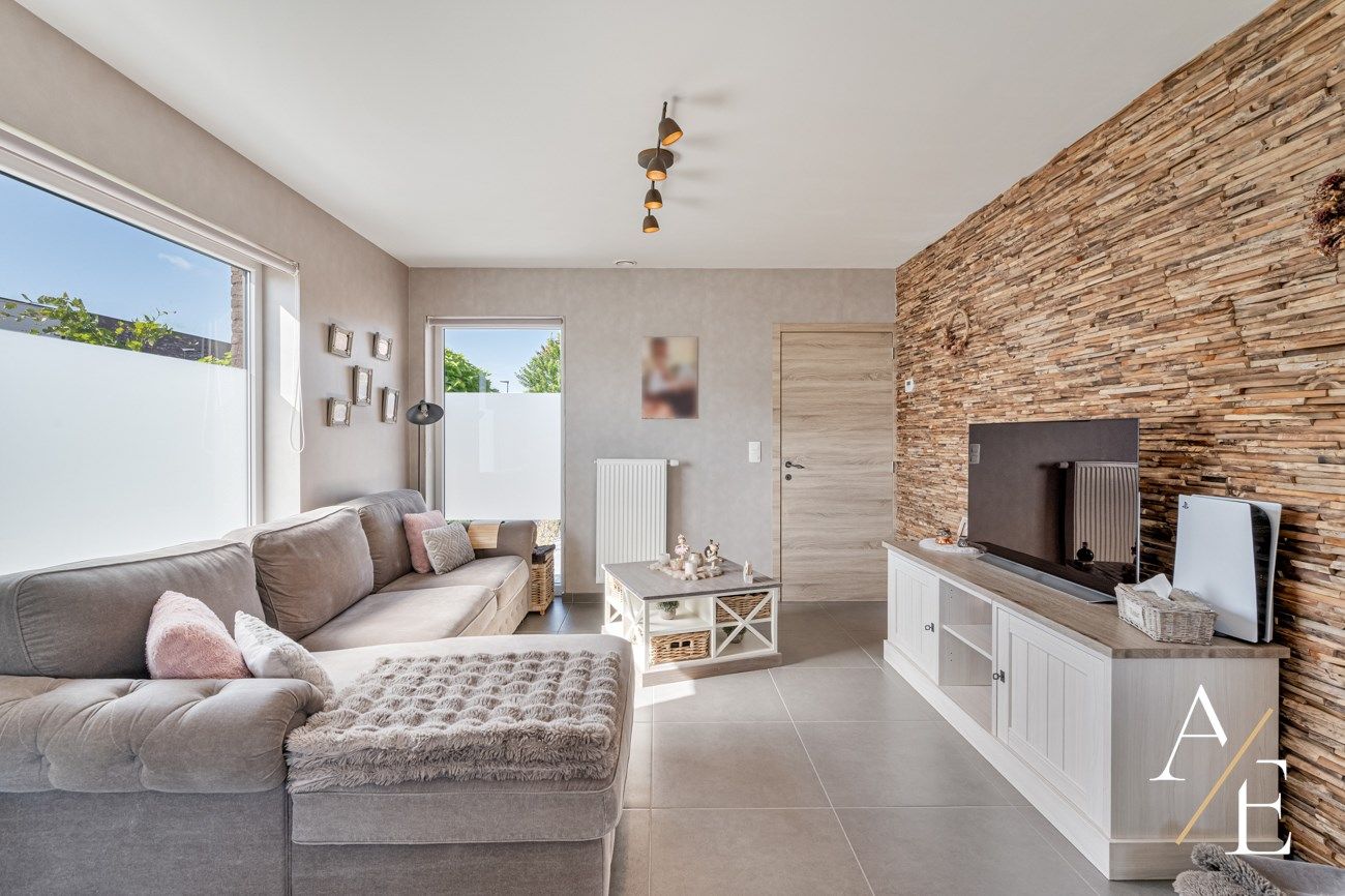 MELLE - Instapklare woning met gezellige tuin, terras en pergola in kindvriendelijke wijk foto 4